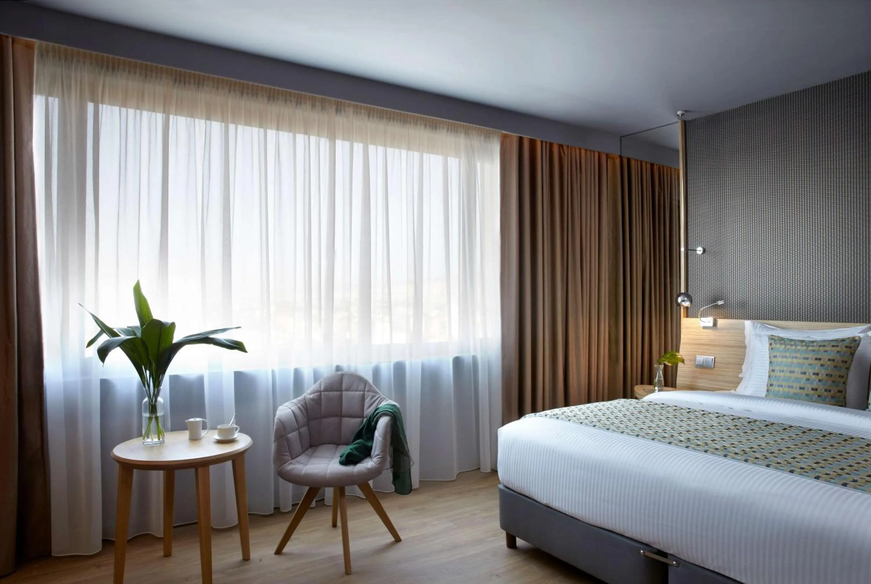Photo of the whole room, Bed in Zeus Wyndham Grand Athens