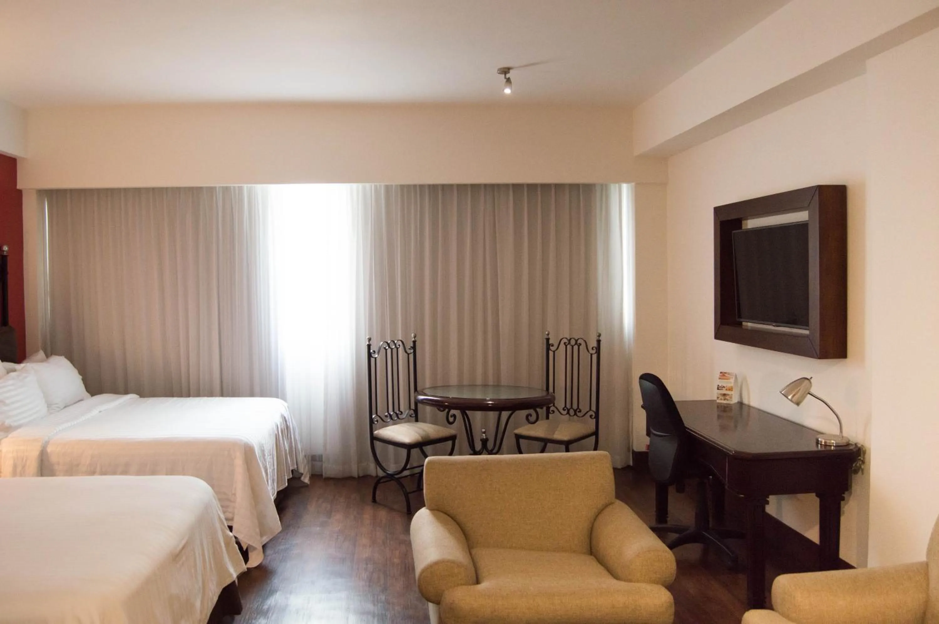 Photo of the whole room, Bed in Holiday Inn Hotel & Suites Centro Historico by IHG