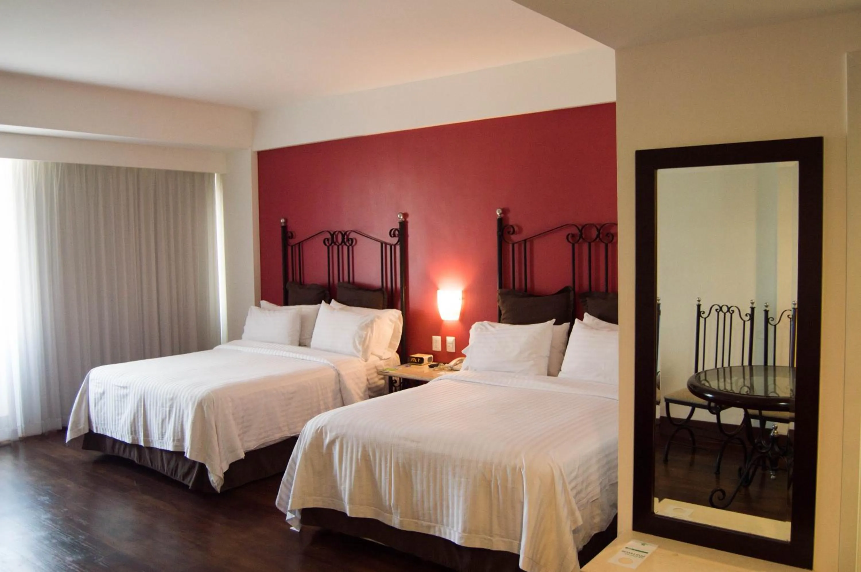 Photo of the whole room, Bed in Holiday Inn Hotel & Suites Centro Historico by IHG