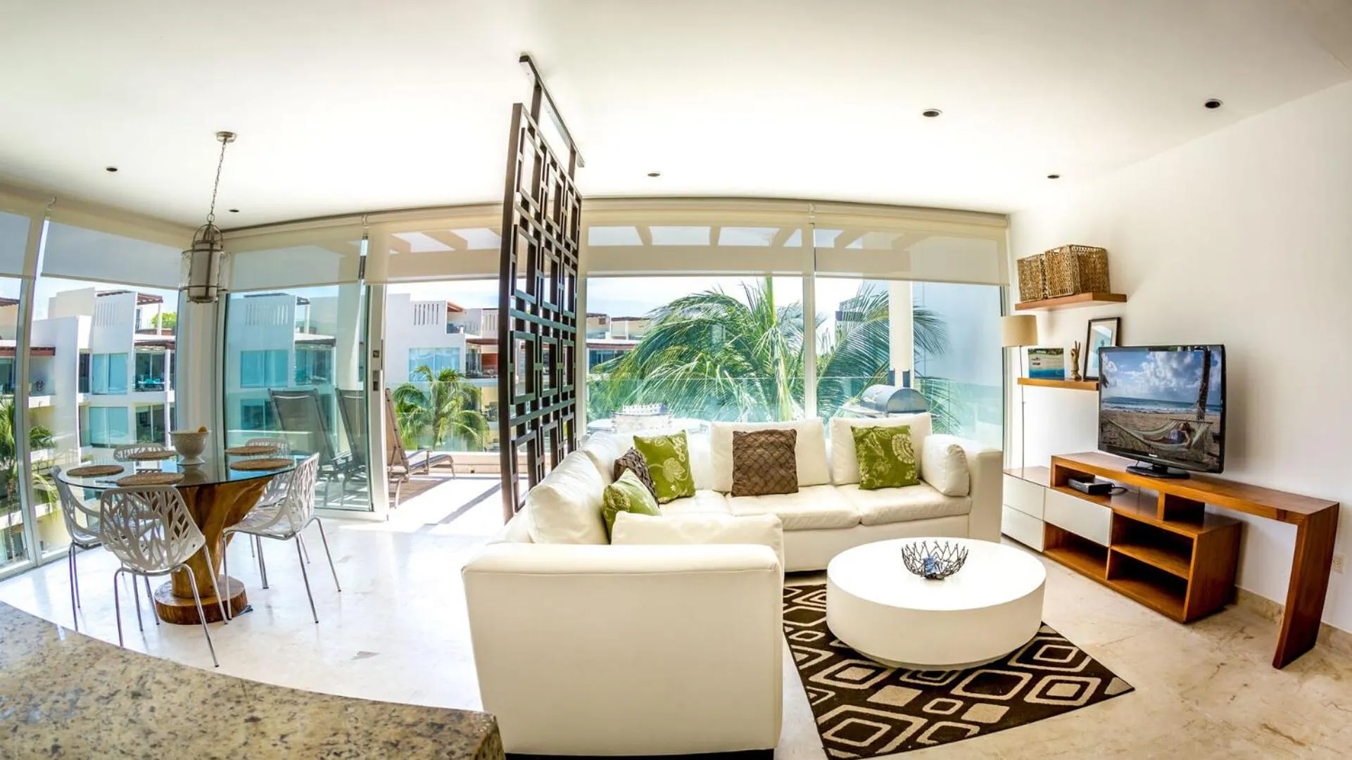 Living room in The Elements Oceanfront & Beachside Condo Hotel