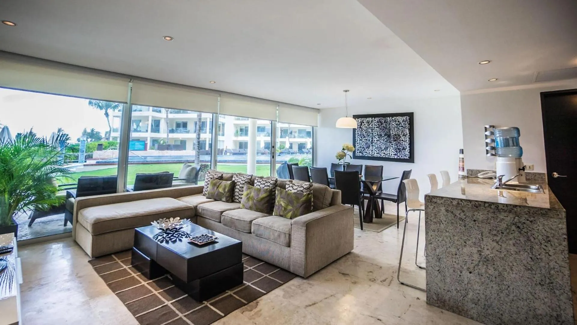 Living room in The Elements Oceanfront & Beachside Condo Hotel