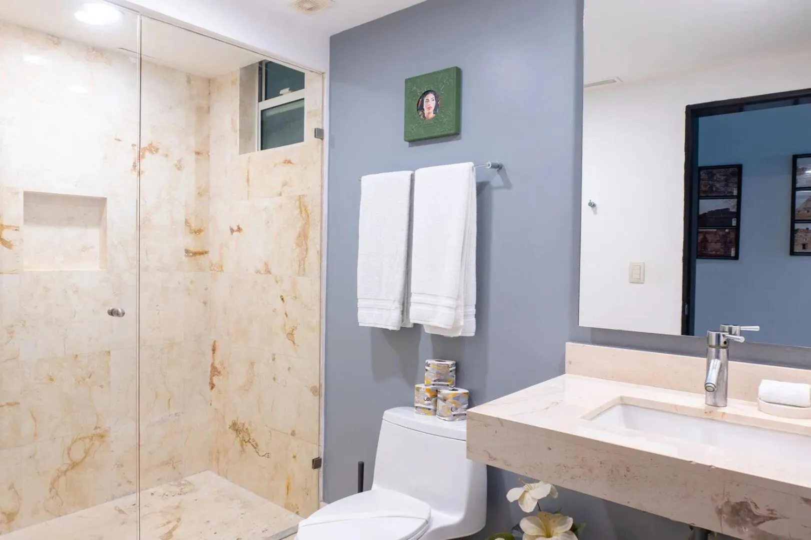 Shower in The Elements Oceanfront & Beachside Condo Hotel