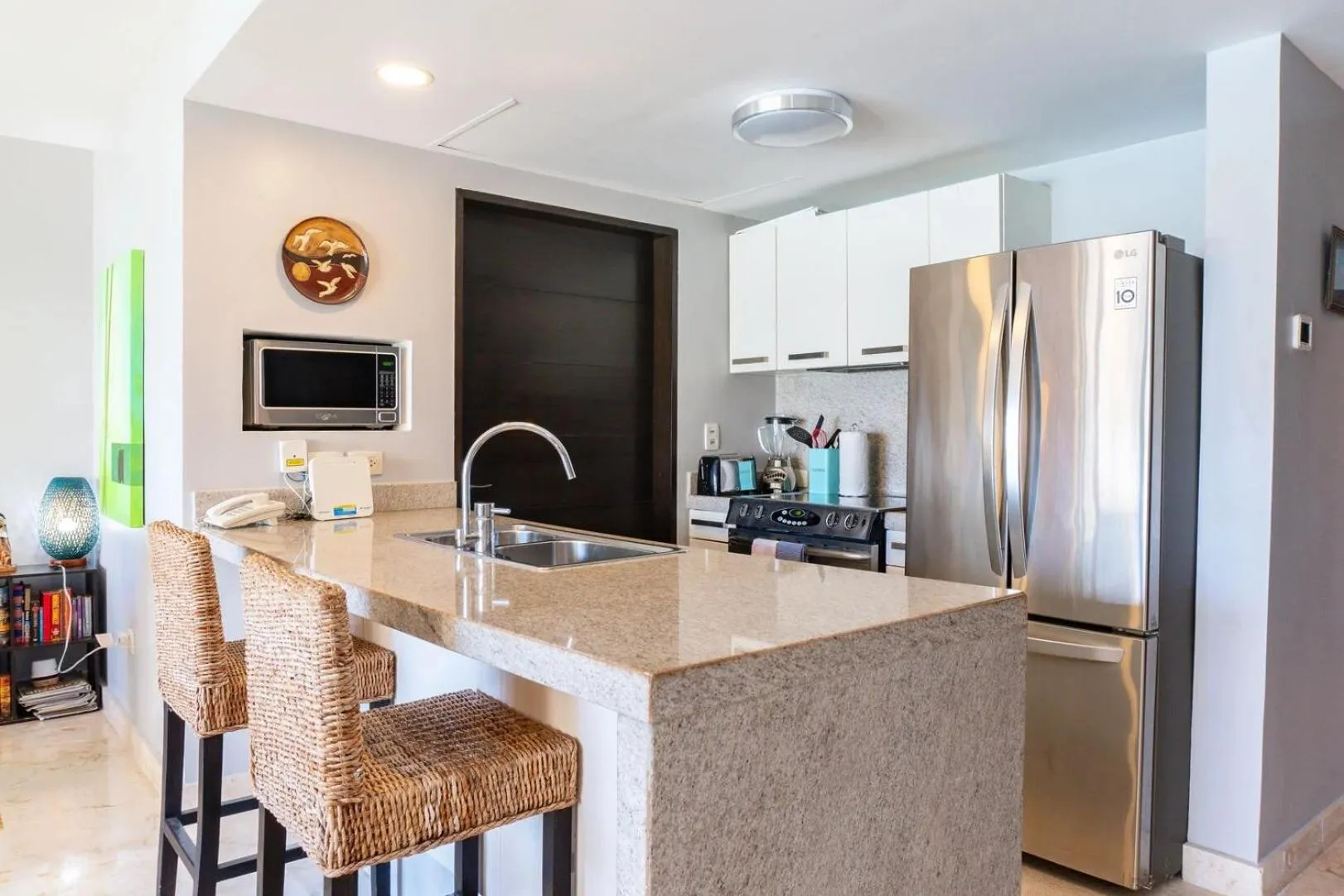 Kitchen or kitchenette in The Elements Oceanfront & Beachside Condo Hotel