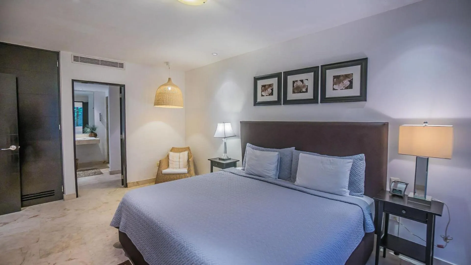 Bed in The Elements Oceanfront & Beachside Condo Hotel