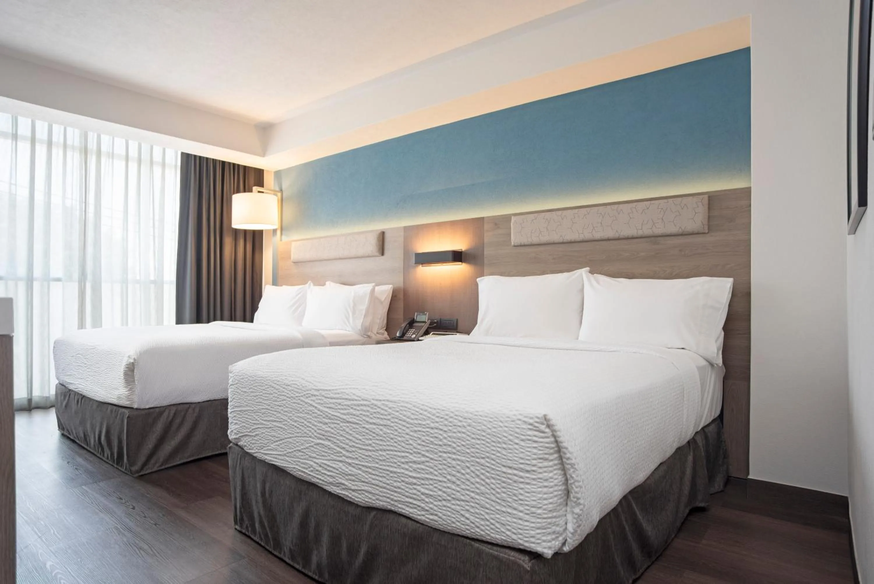 Bed in Holiday Inn Express Guadalajara Expo by IHG