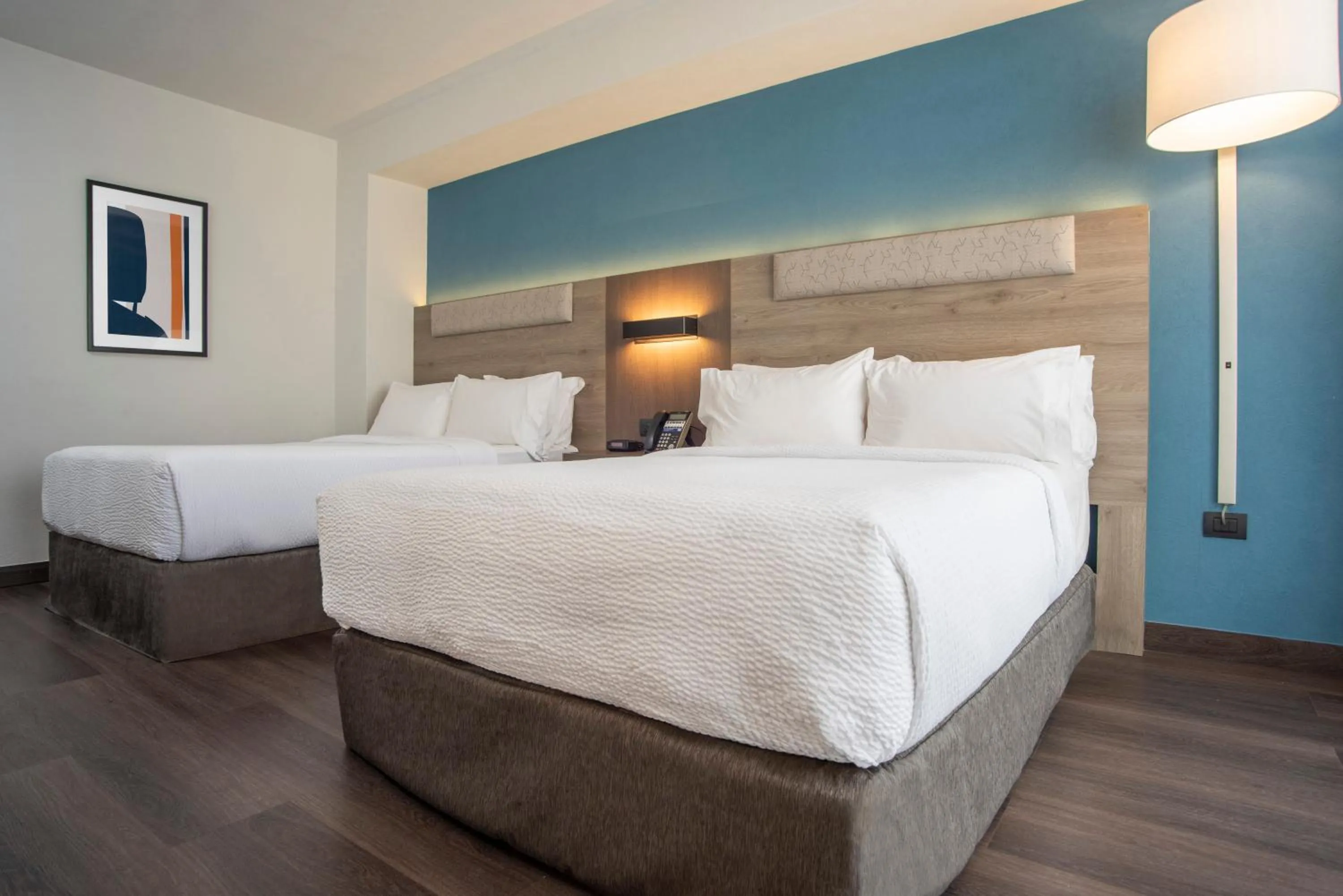 Bed in Holiday Inn Express Guadalajara Expo by IHG