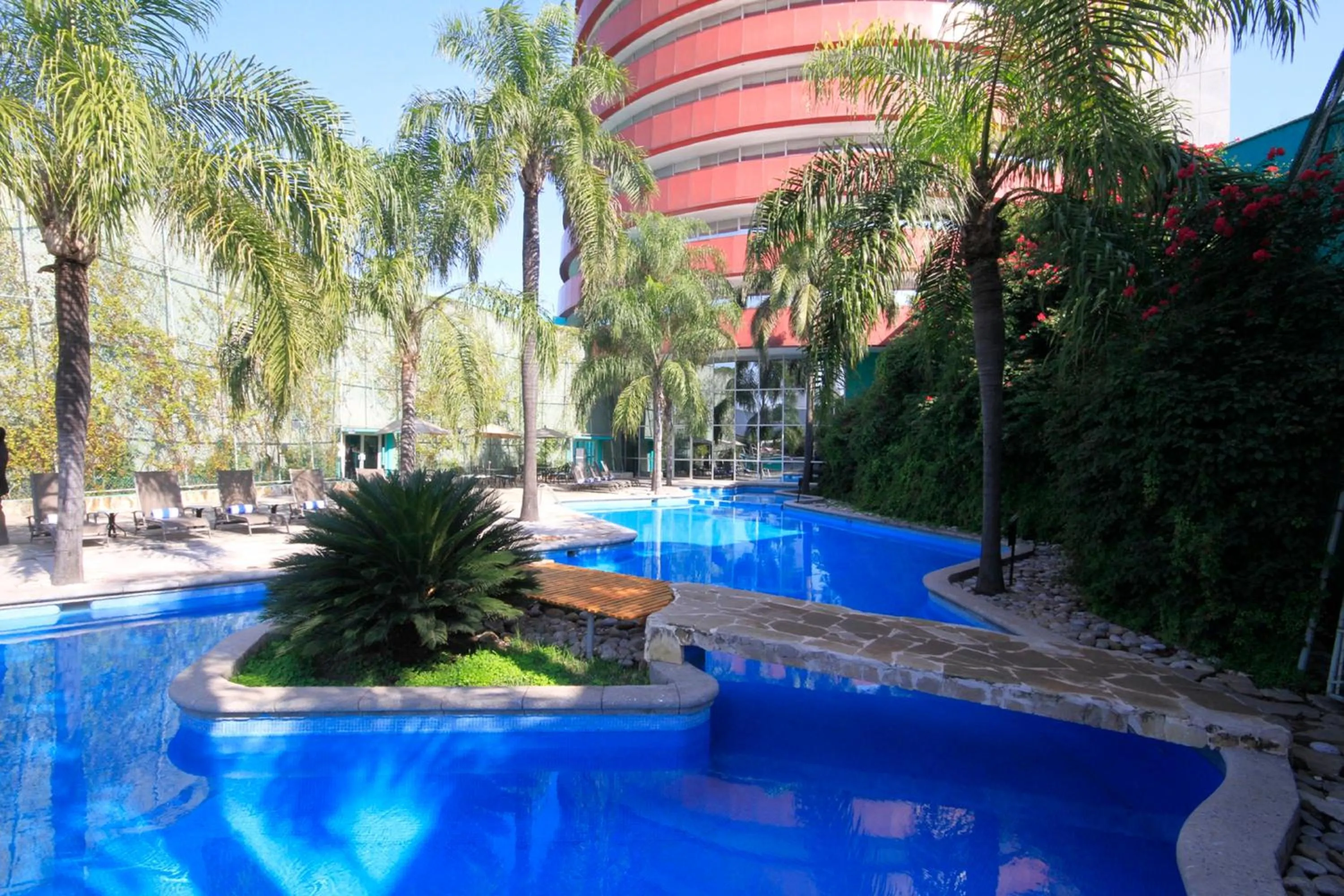 Swimming pool in Holiday Inn Monterrey-Parque Fundidora by IHG