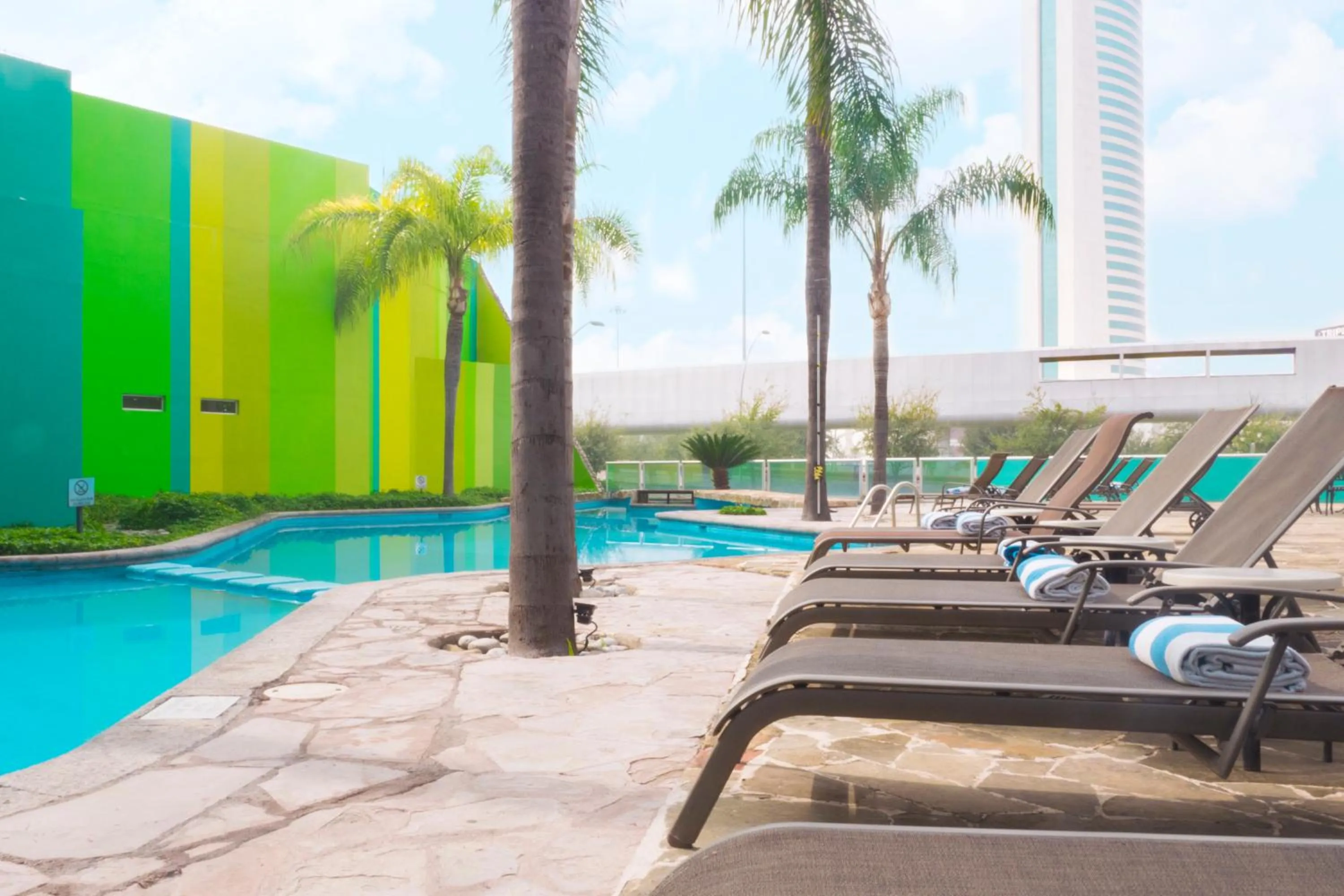 Swimming pool in Holiday Inn Monterrey-Parque Fundidora by IHG