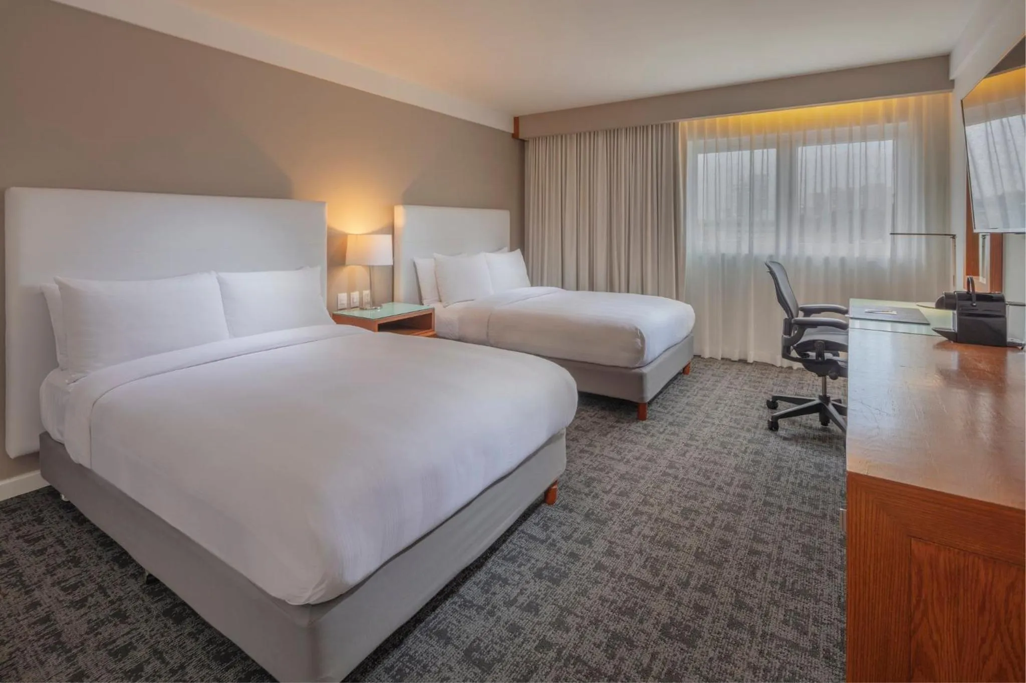 Photo of the whole room, Bed in Presidente InterContinental Puebla by IHG