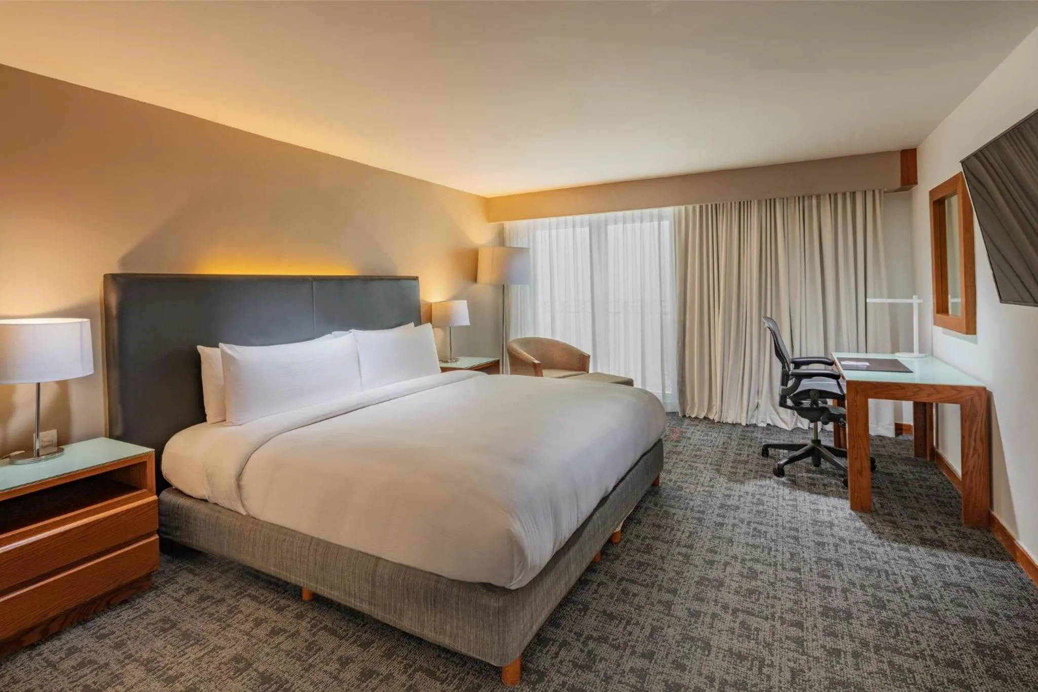 Photo of the whole room, Bed in Presidente InterContinental Puebla by IHG