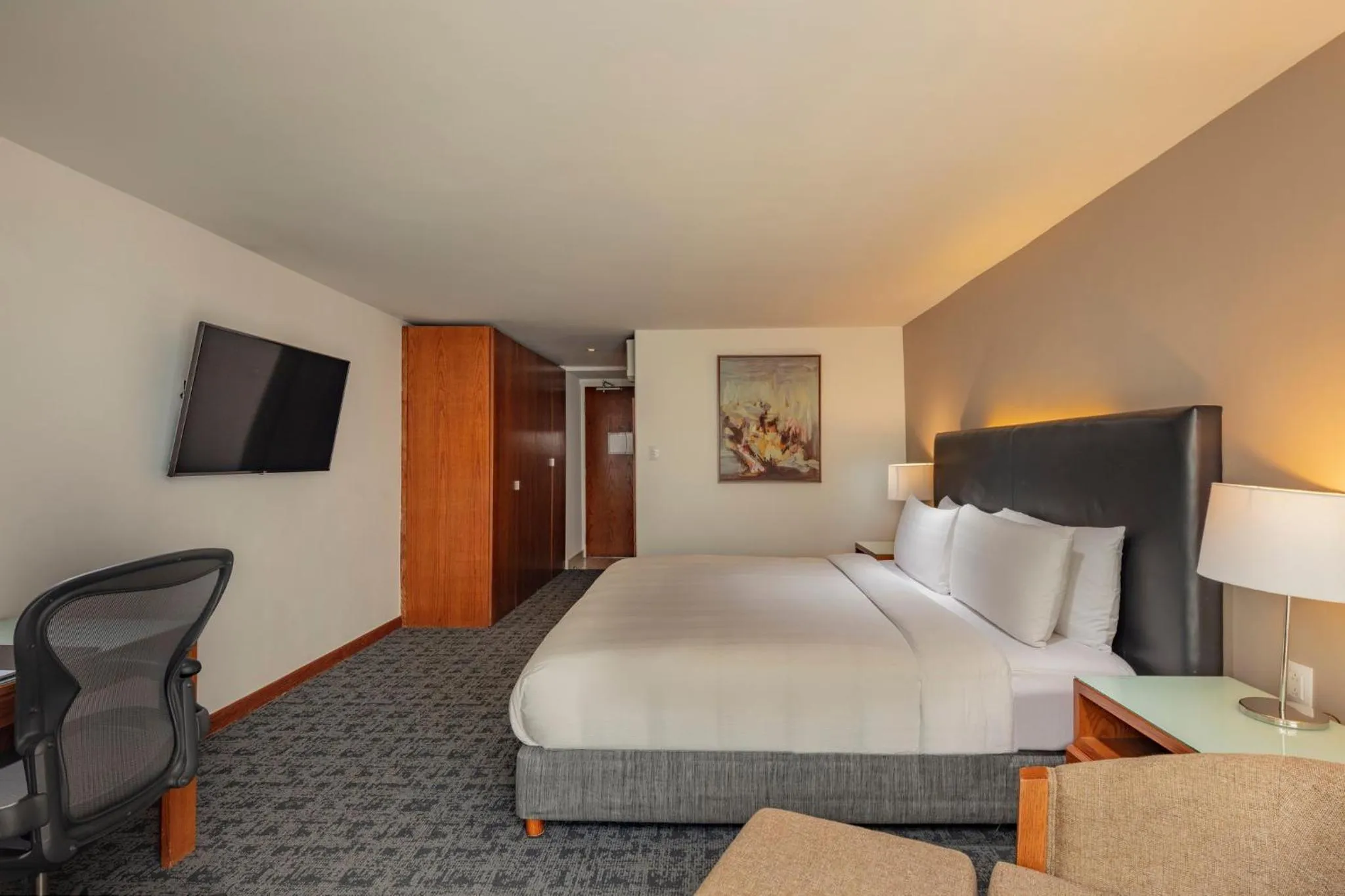 Photo of the whole room, Bed in Presidente InterContinental Puebla by IHG