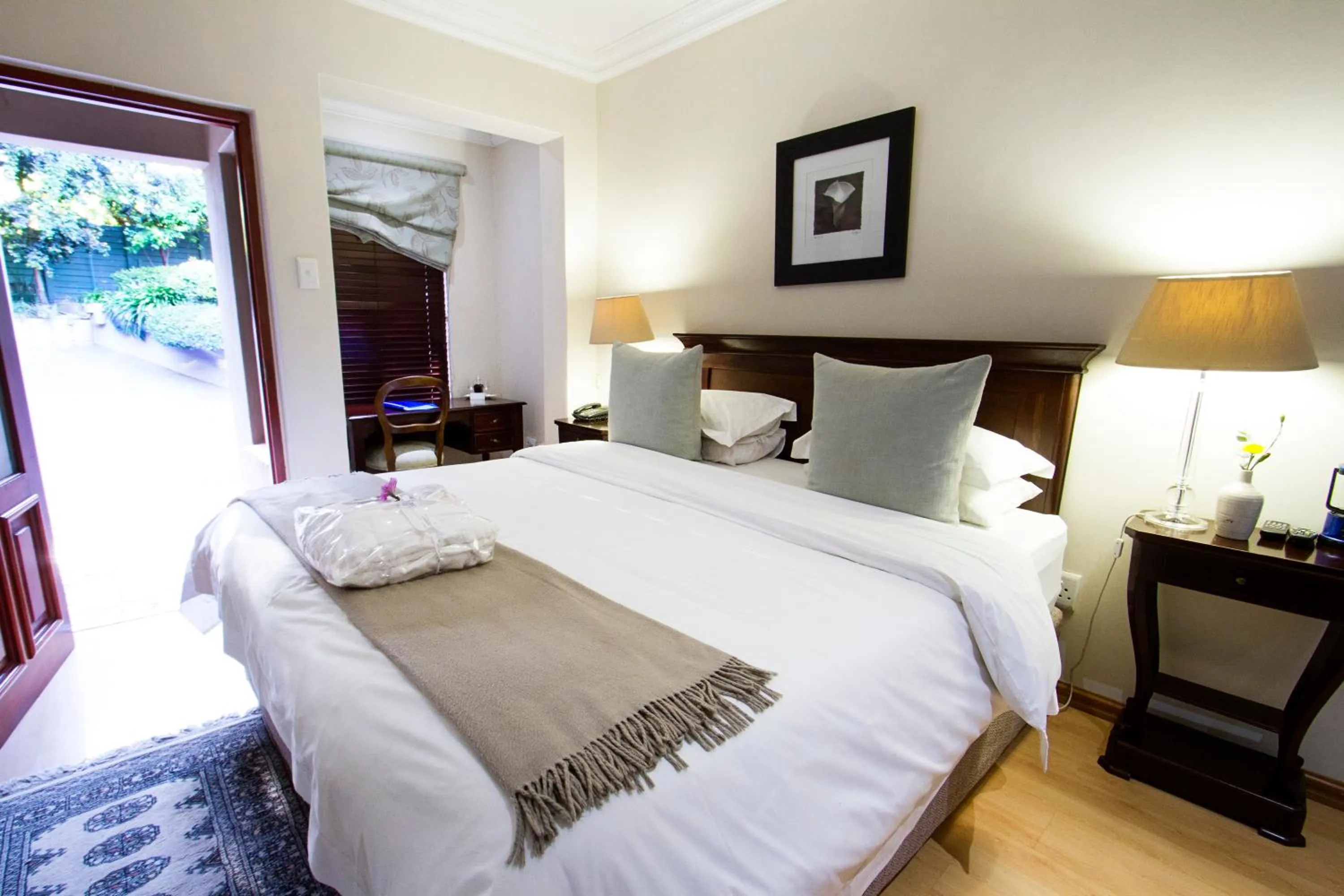 Photo of the whole room, Bed in Bellgrove Guest House Sandton