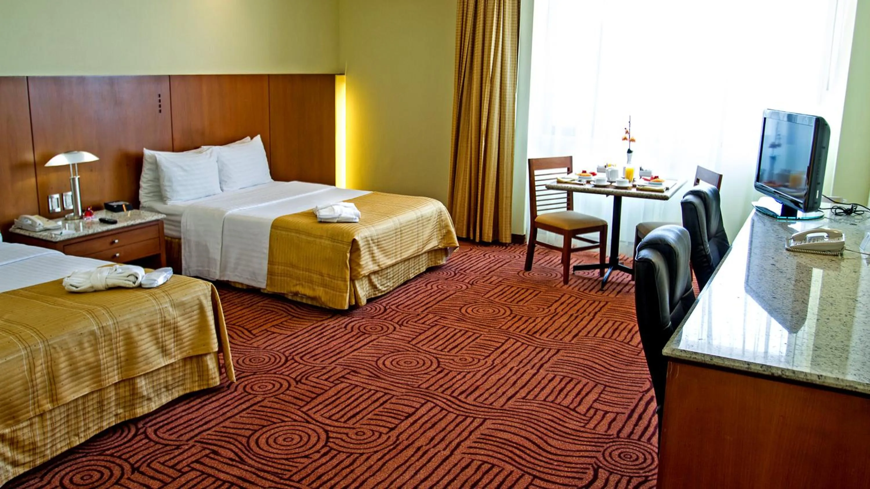 Photo of the whole room, Bed in Holiday Inn Puebla Finsa by IHG