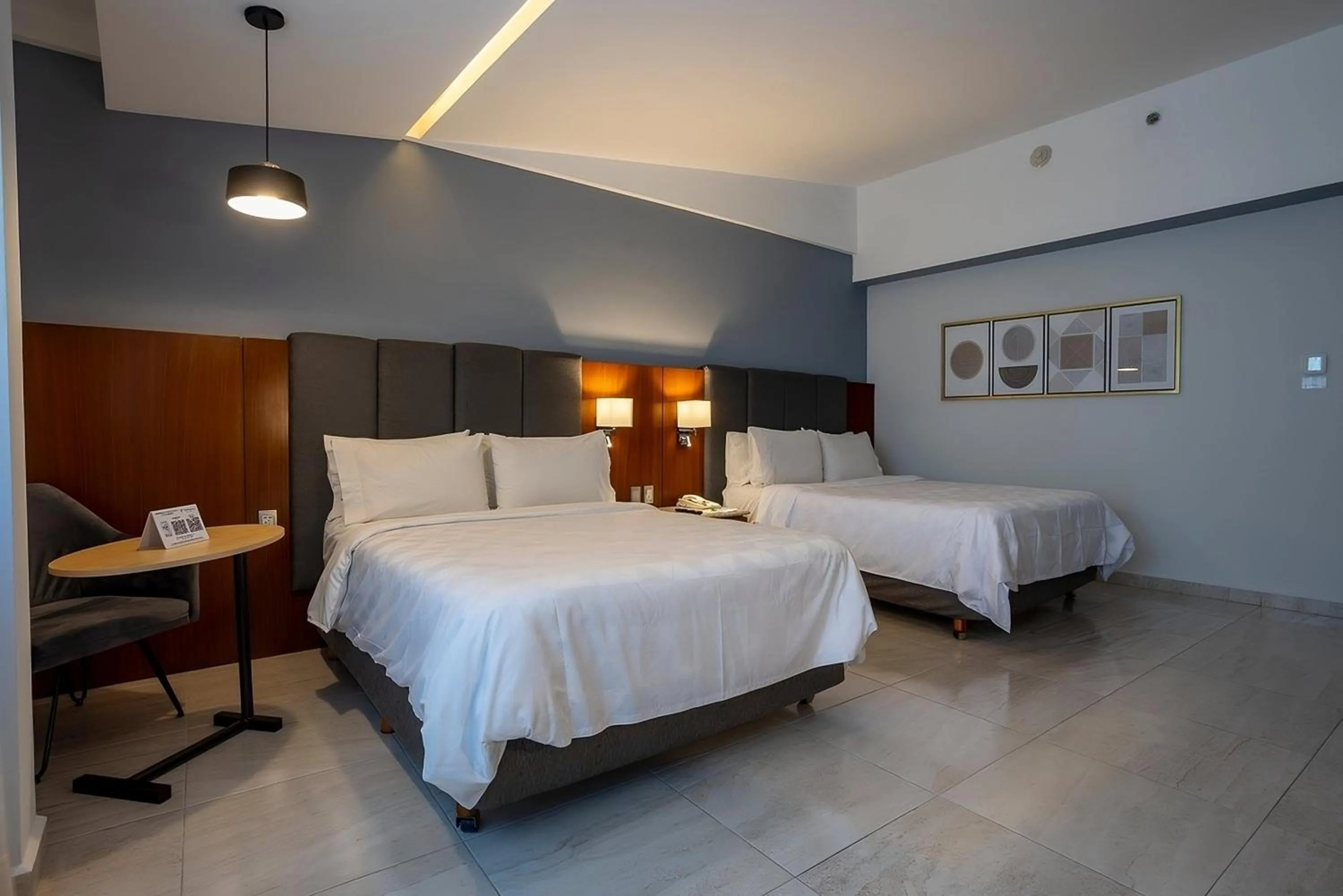 Photo of the whole room, Bed in Holiday Inn Puebla Finsa by IHG