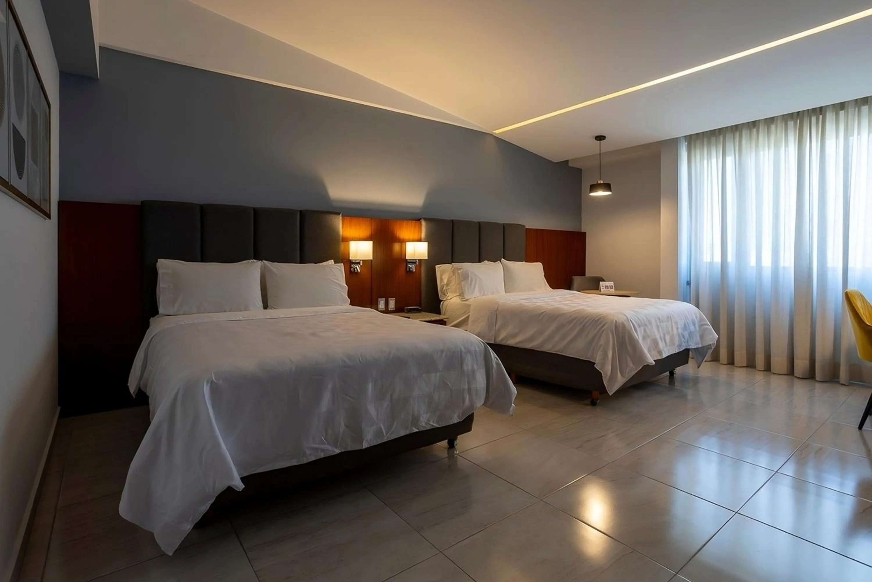 soundproof, Bed in Holiday Inn Puebla Finsa by IHG