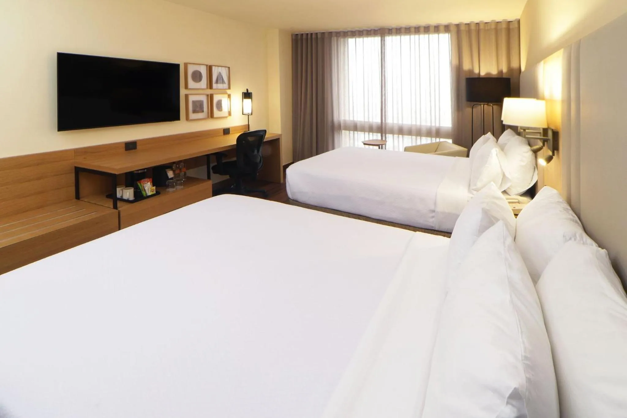 Photo of the whole room, Bed in Crowne Plaza Hotel Monterrey by IHG