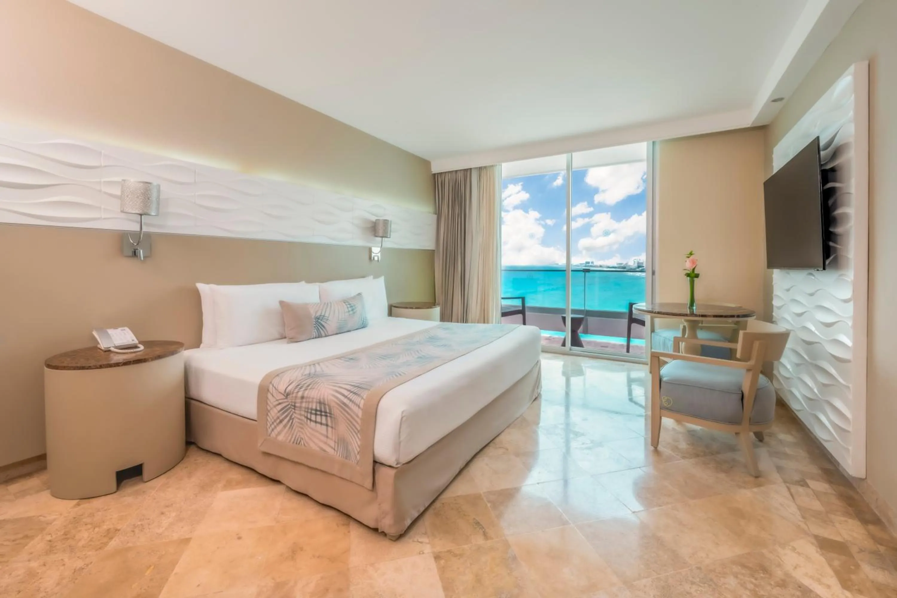 Bed in Krystal Grand Cancun All Inclusive