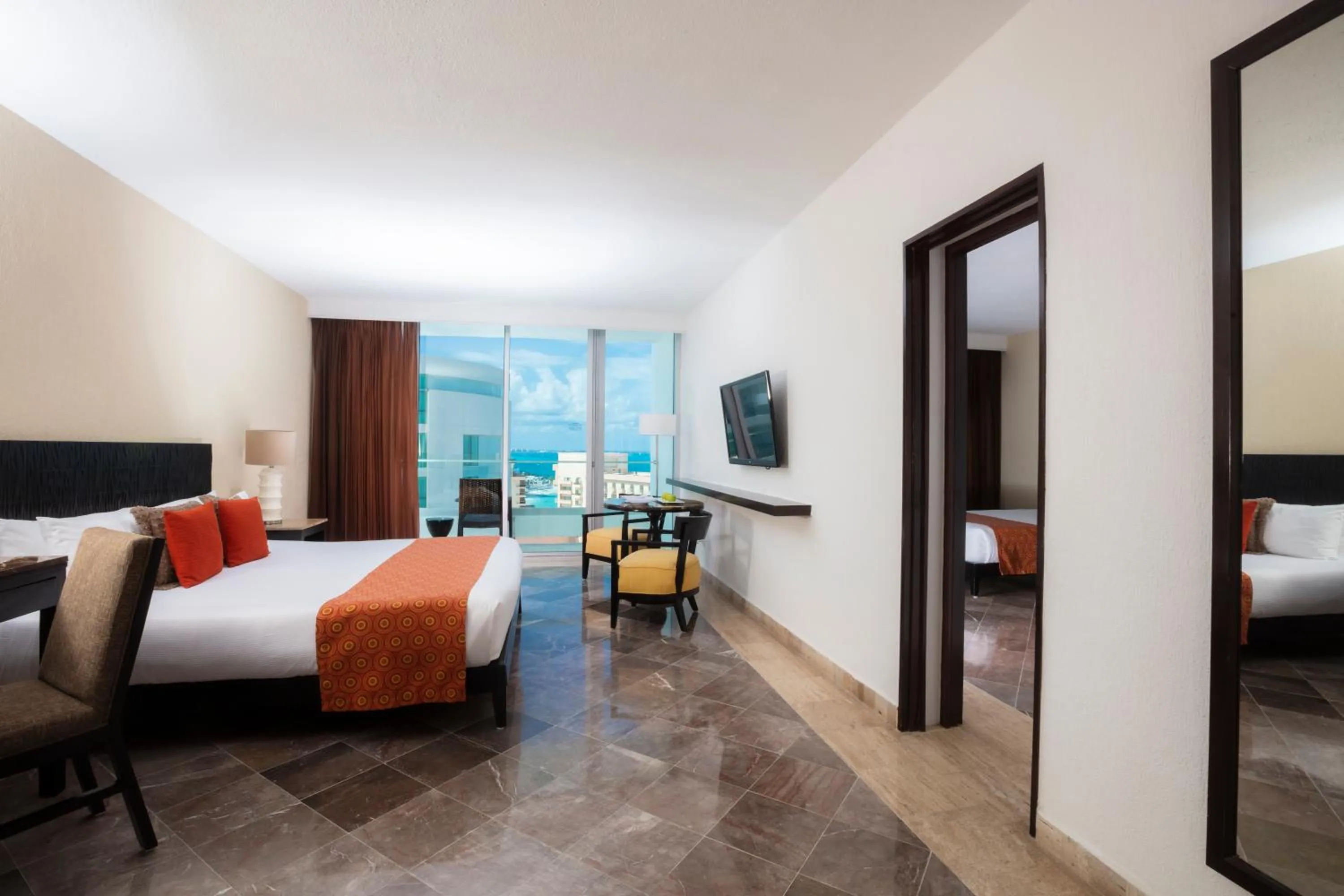 Bed in Krystal Grand Cancun All Inclusive