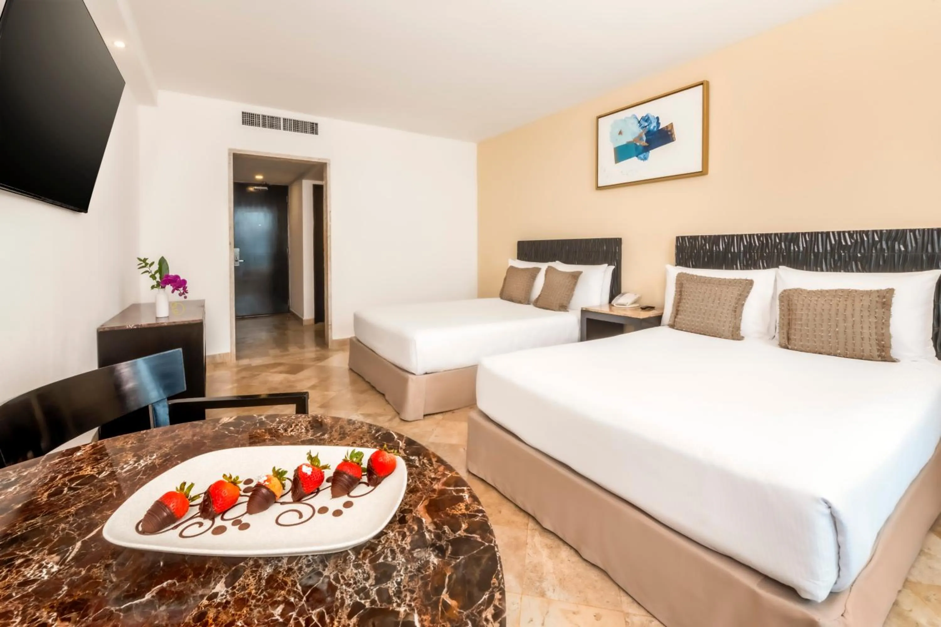 Bed in Krystal Grand Cancun All Inclusive