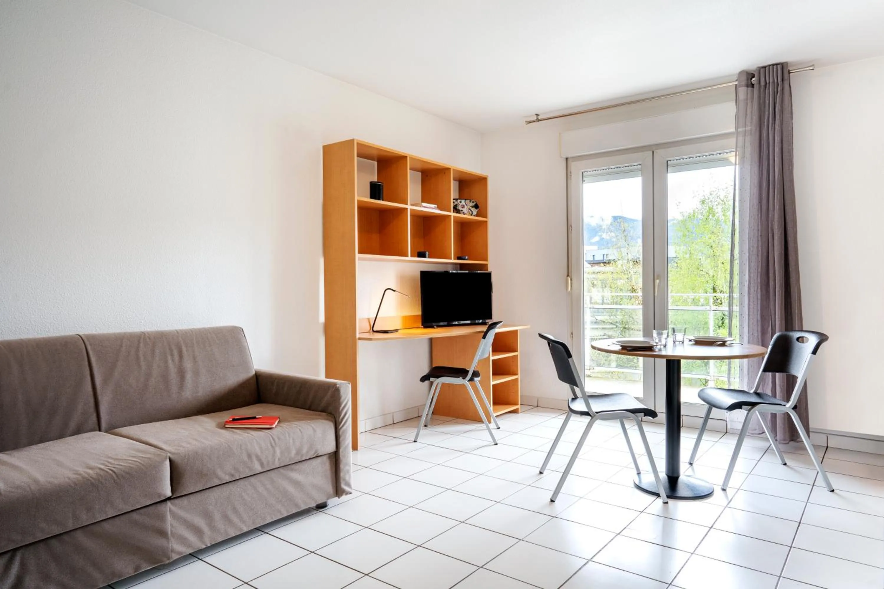 Living room in Séjours & Affaires Annecy Le Pont Neuf