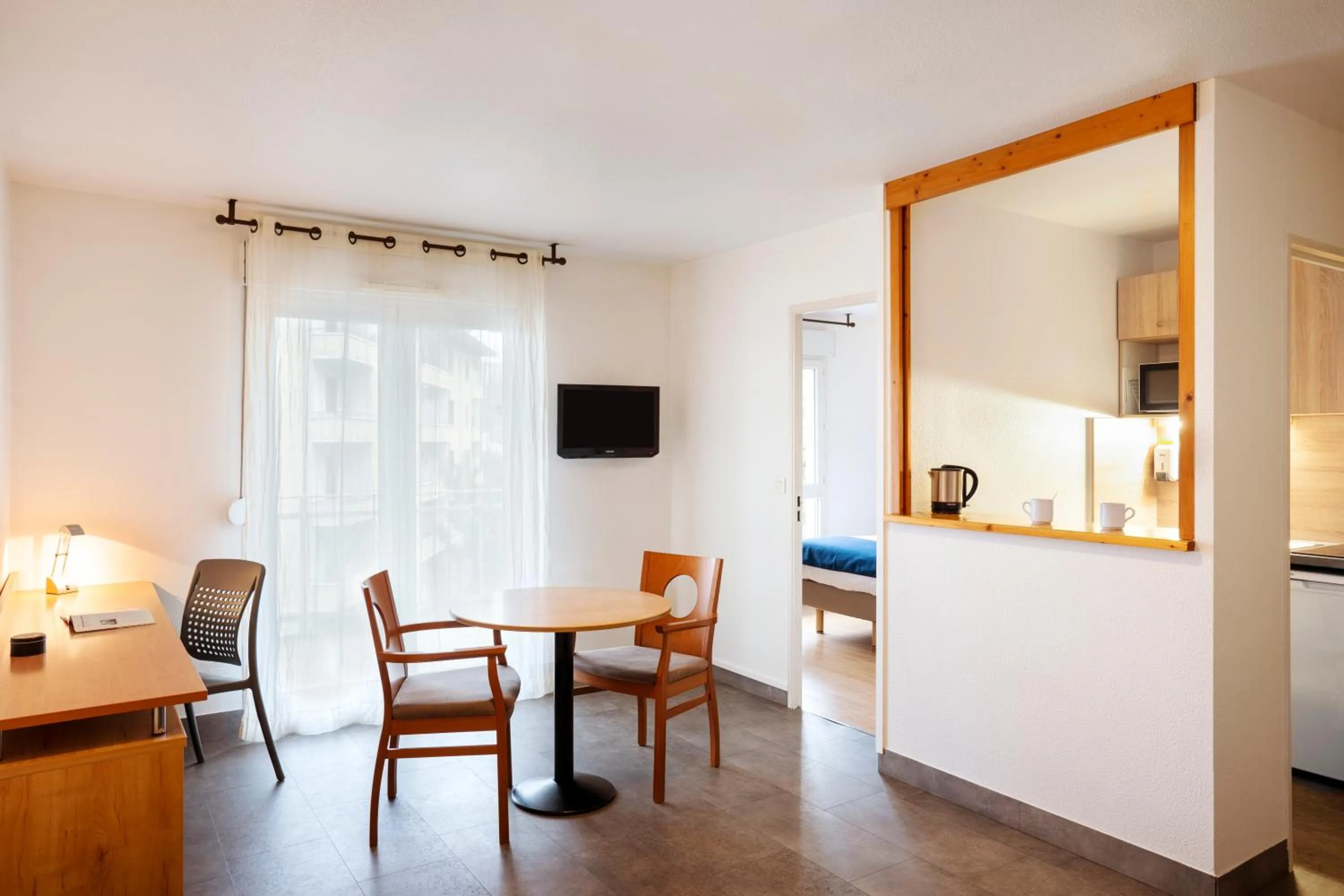 Seating area in Séjours & Affaires Annecy Le Pont Neuf