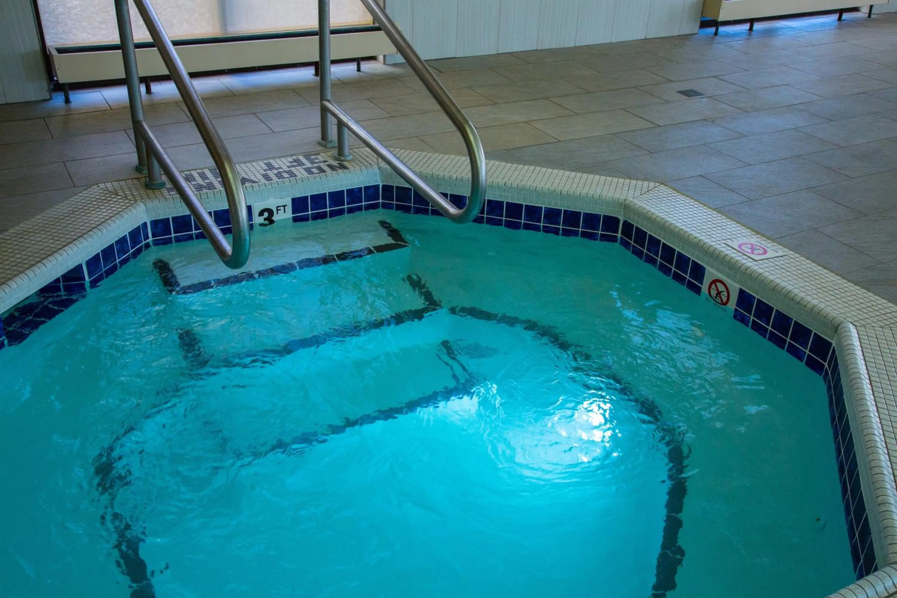 Swimming pool in DoubleTree by Hilton Rapid City Downtown Convention Center