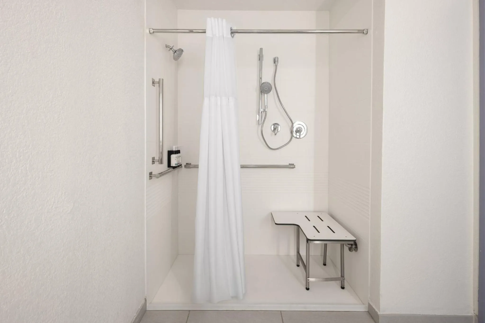 Bathroom in Garner Hotel Brookings by IHG