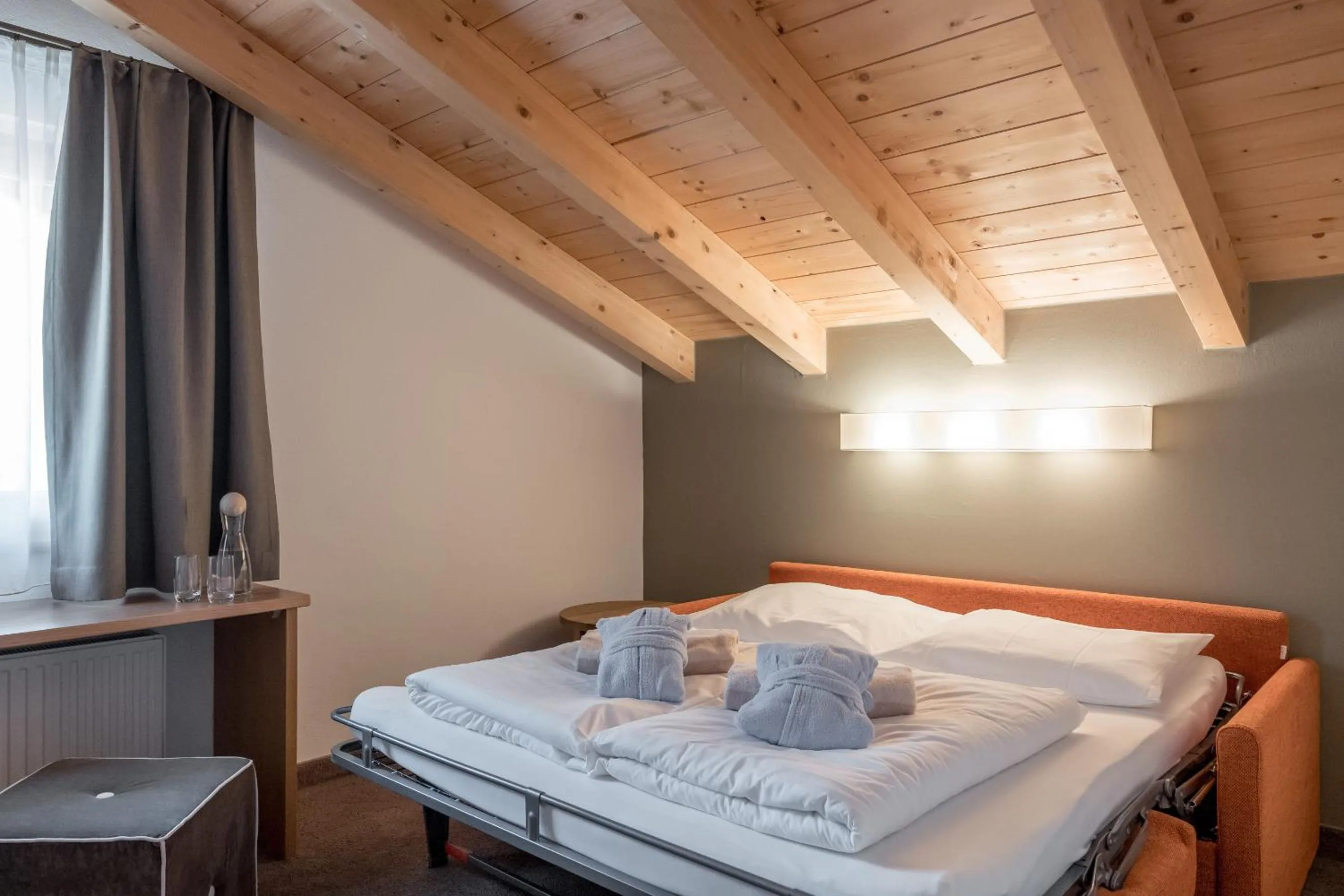 Bed in Hotel Tyrolerhof