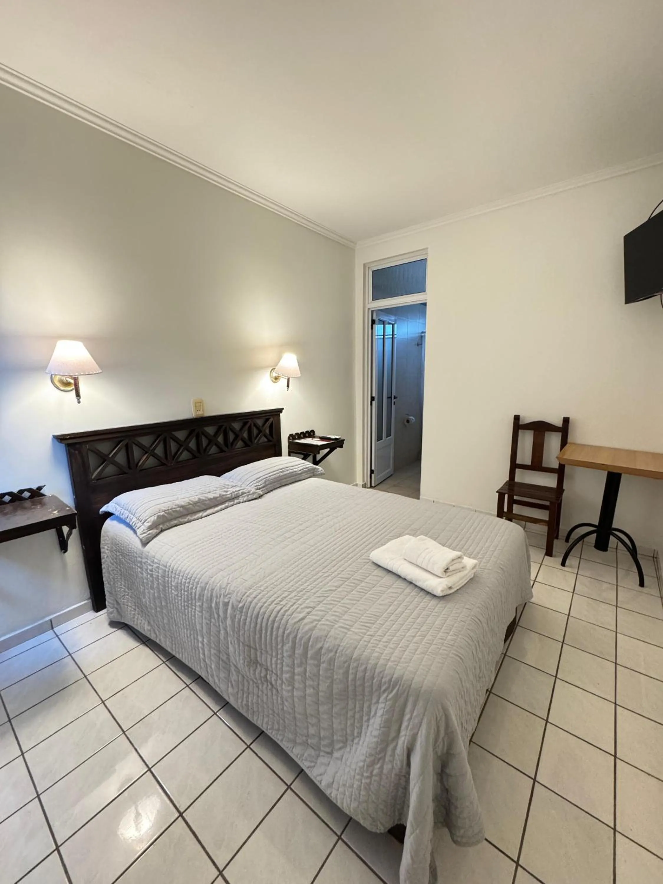 Bed in Hotel Frossard