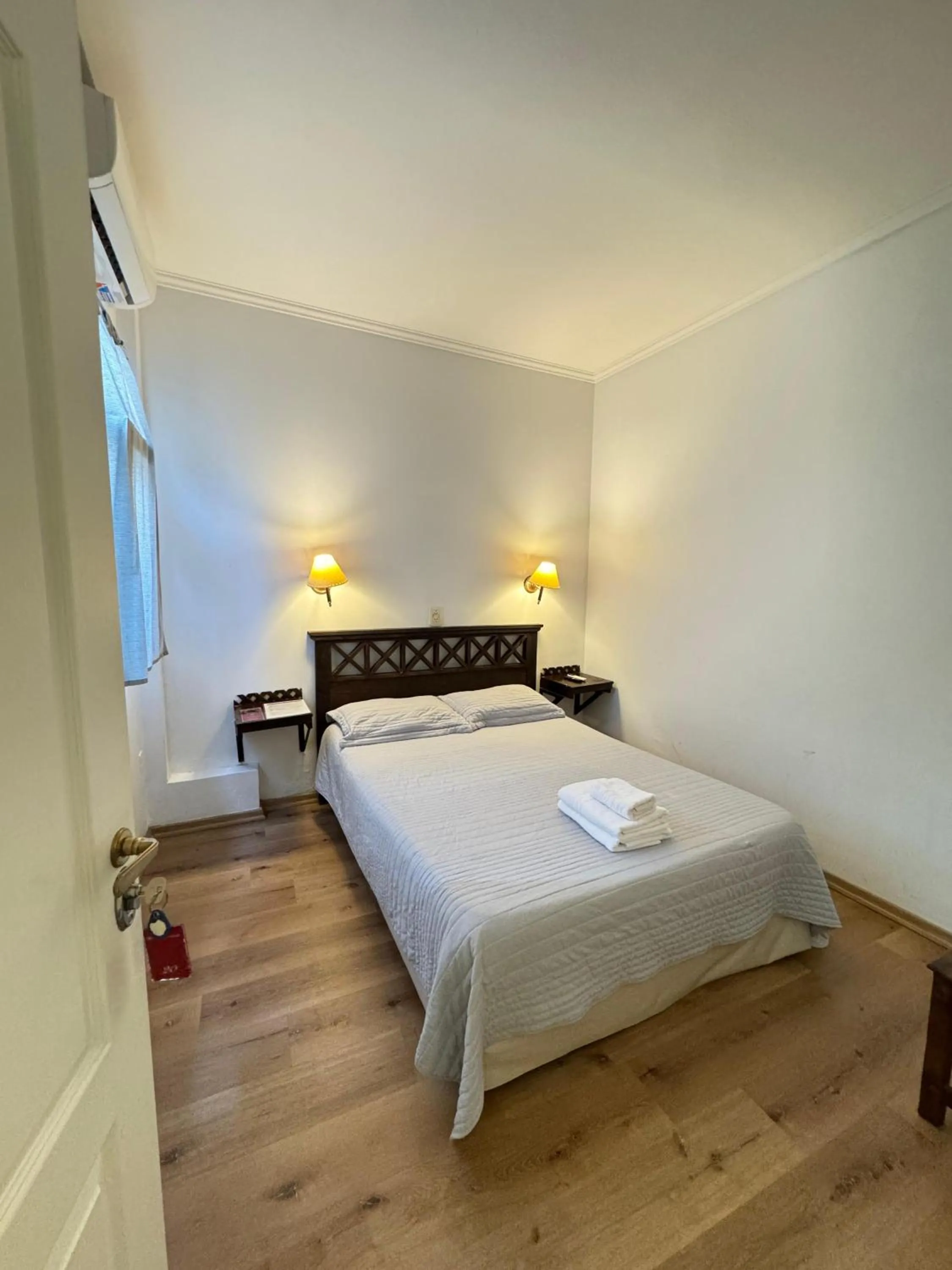 Bed in Hotel Frossard