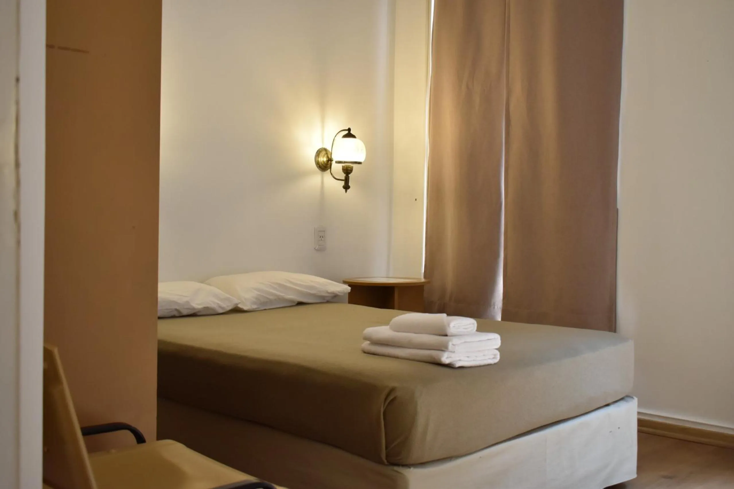 Bed in Hotel Frossard