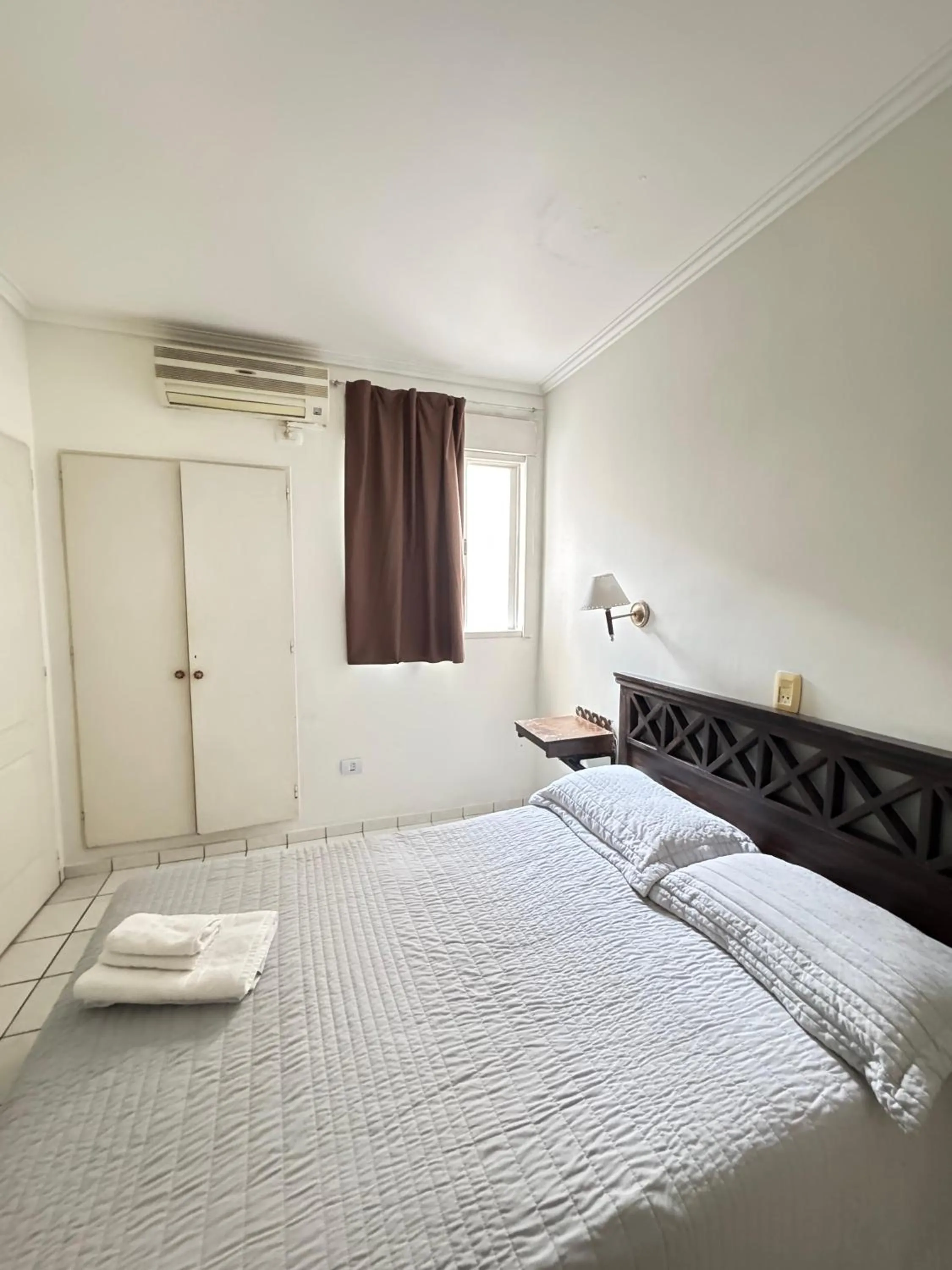 Bed in Hotel Frossard