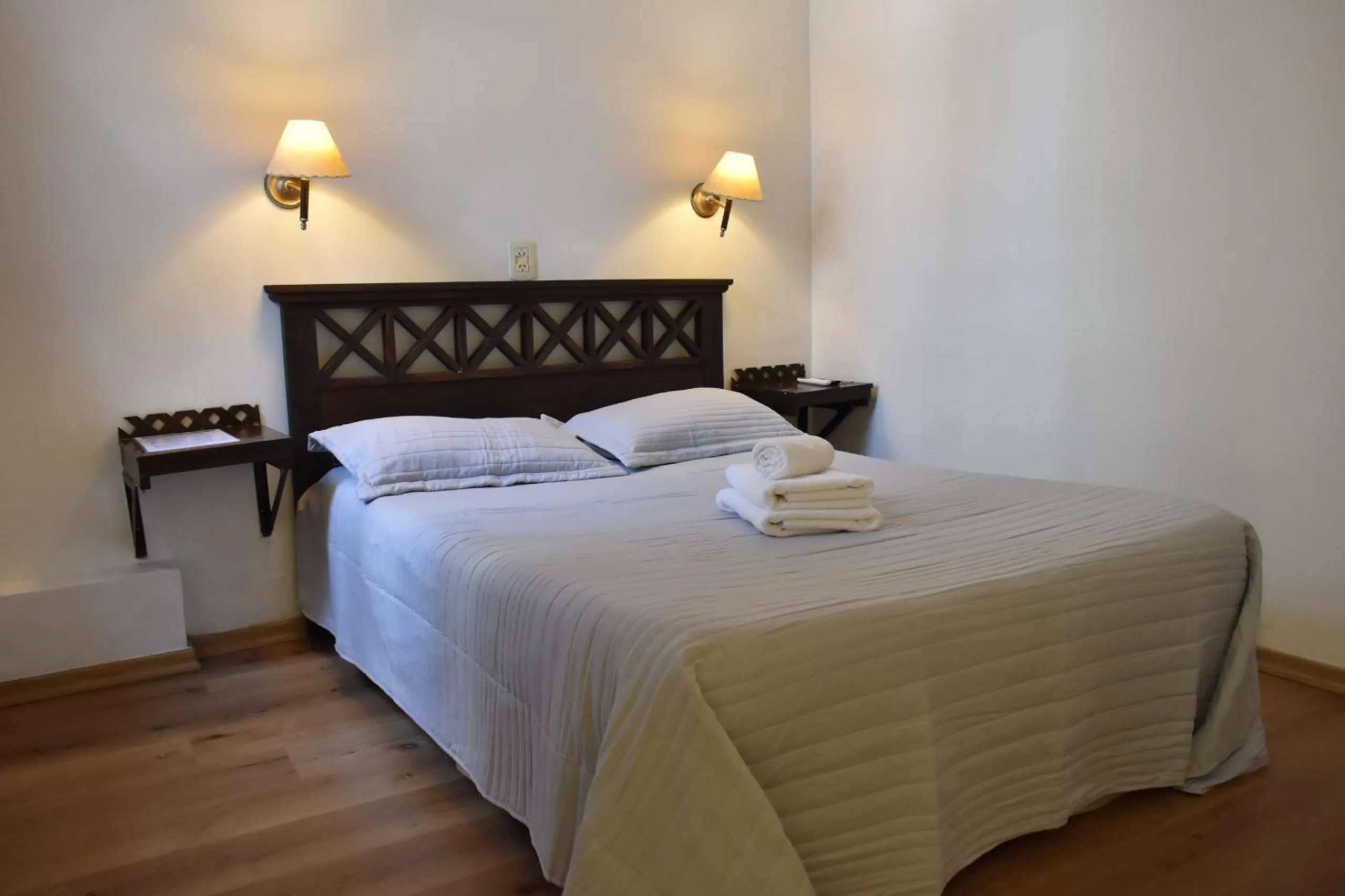 Bed in Hotel Frossard