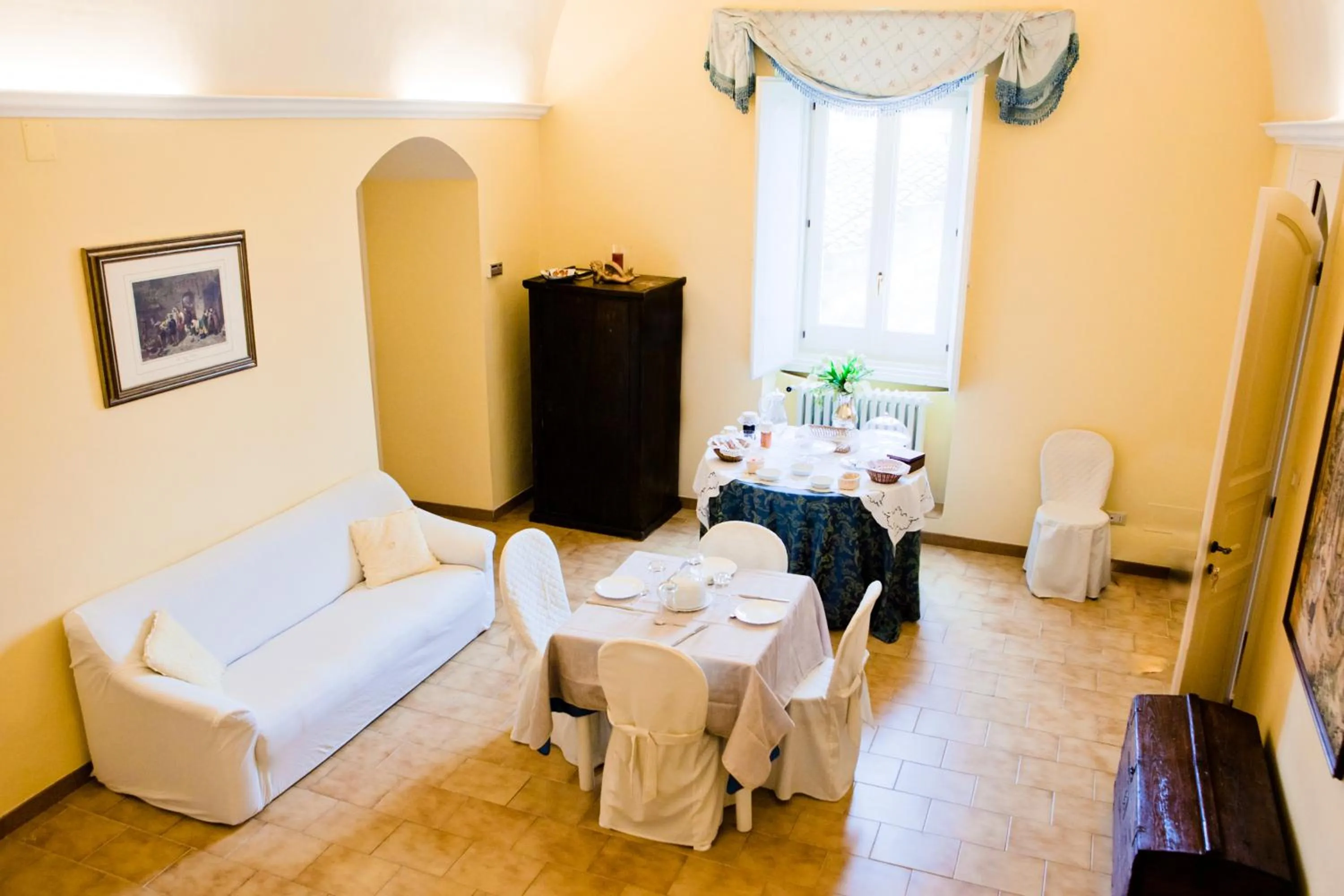 Communal lounge/ TV room in La Casa di Ele