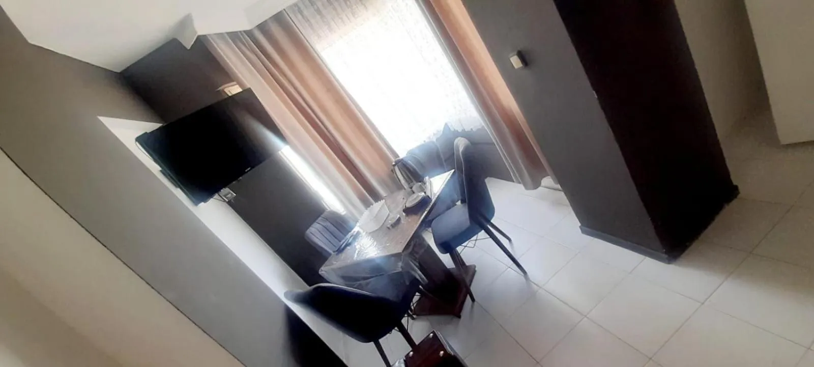 Communal lounge/ TV room in Zeytindali Apart Hotel