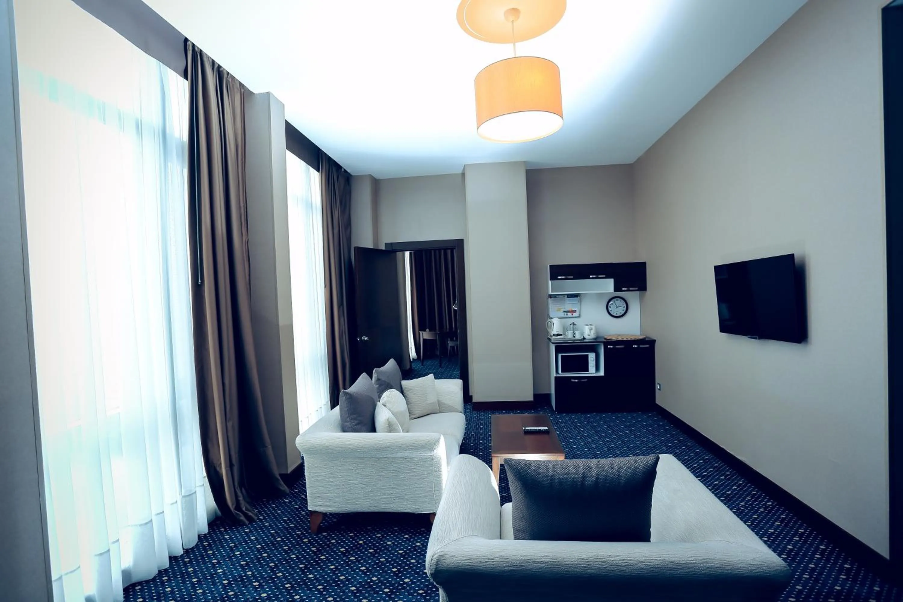 Bedroom in Parkside Hotel & Apartments