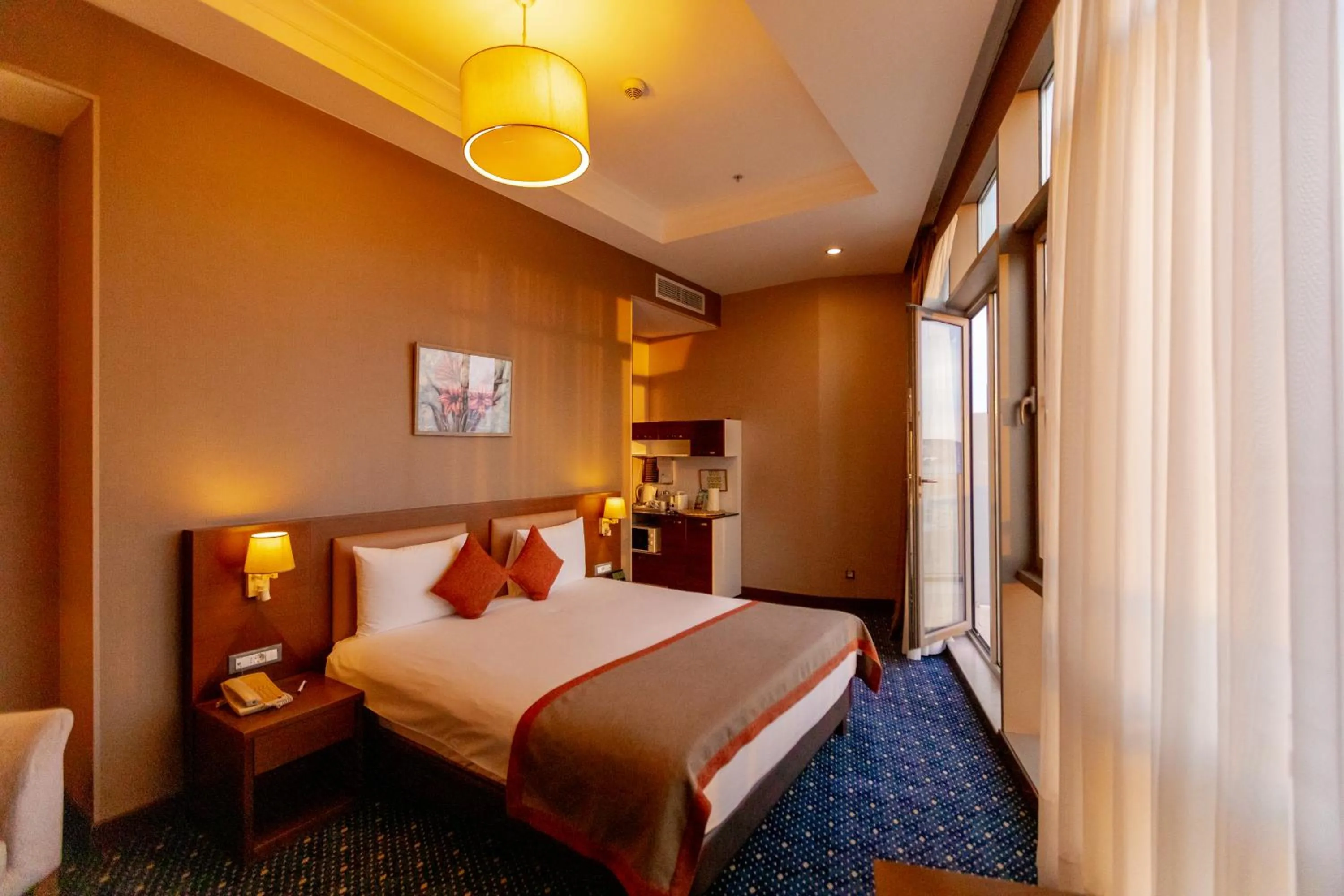 Bed in Parkside Hotel & Apartments