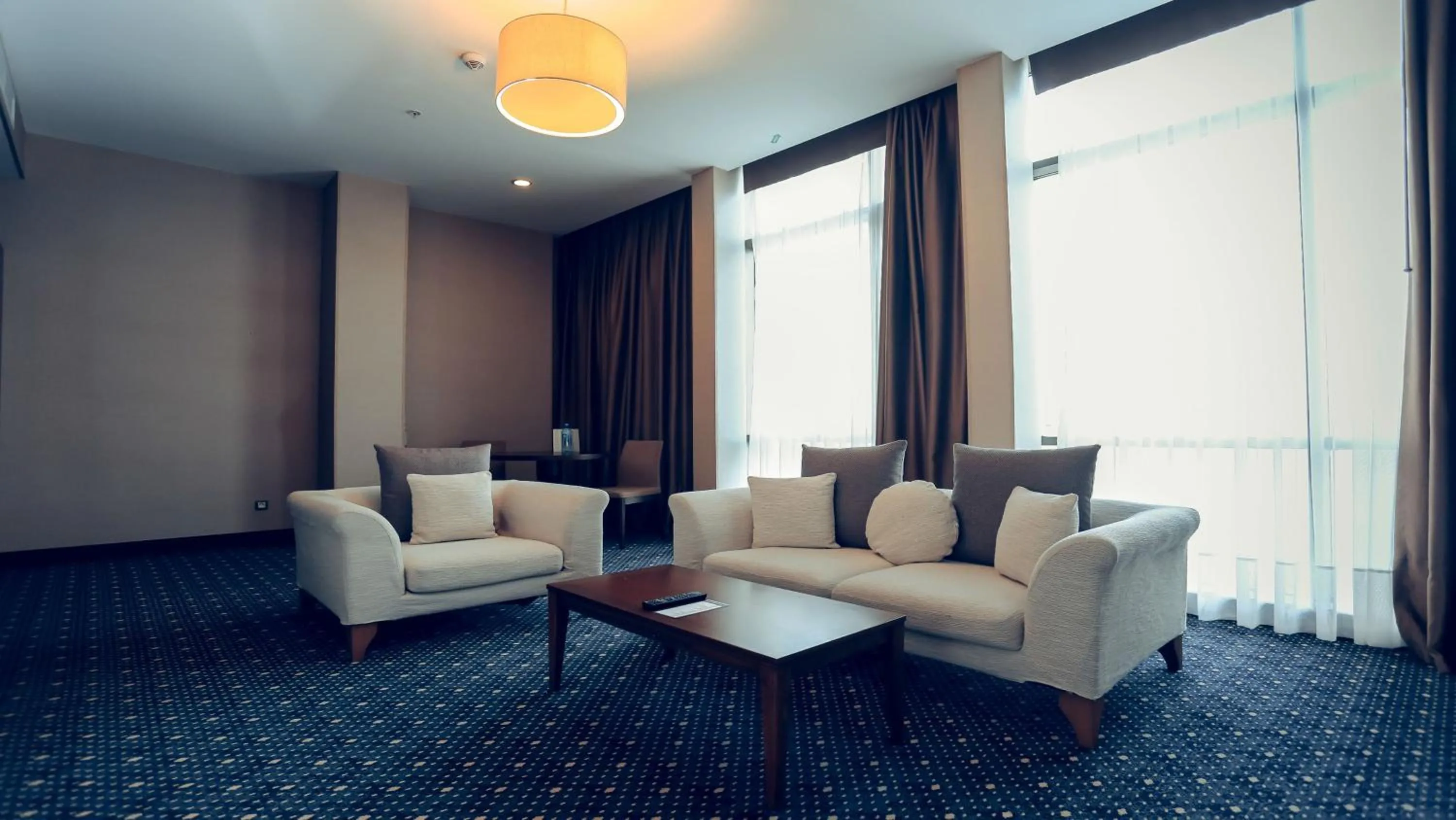 Bedroom in Parkside Hotel & Apartments