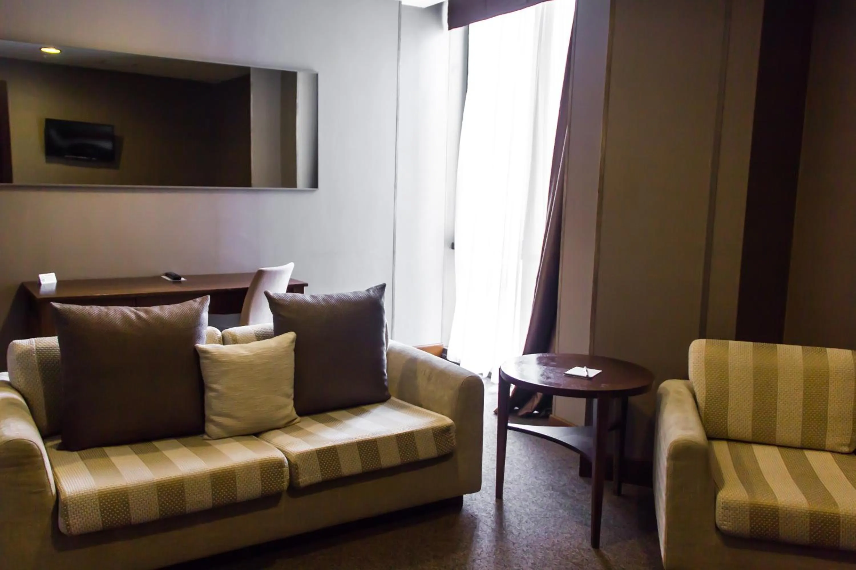 Bedroom in Parkside Hotel & Apartments