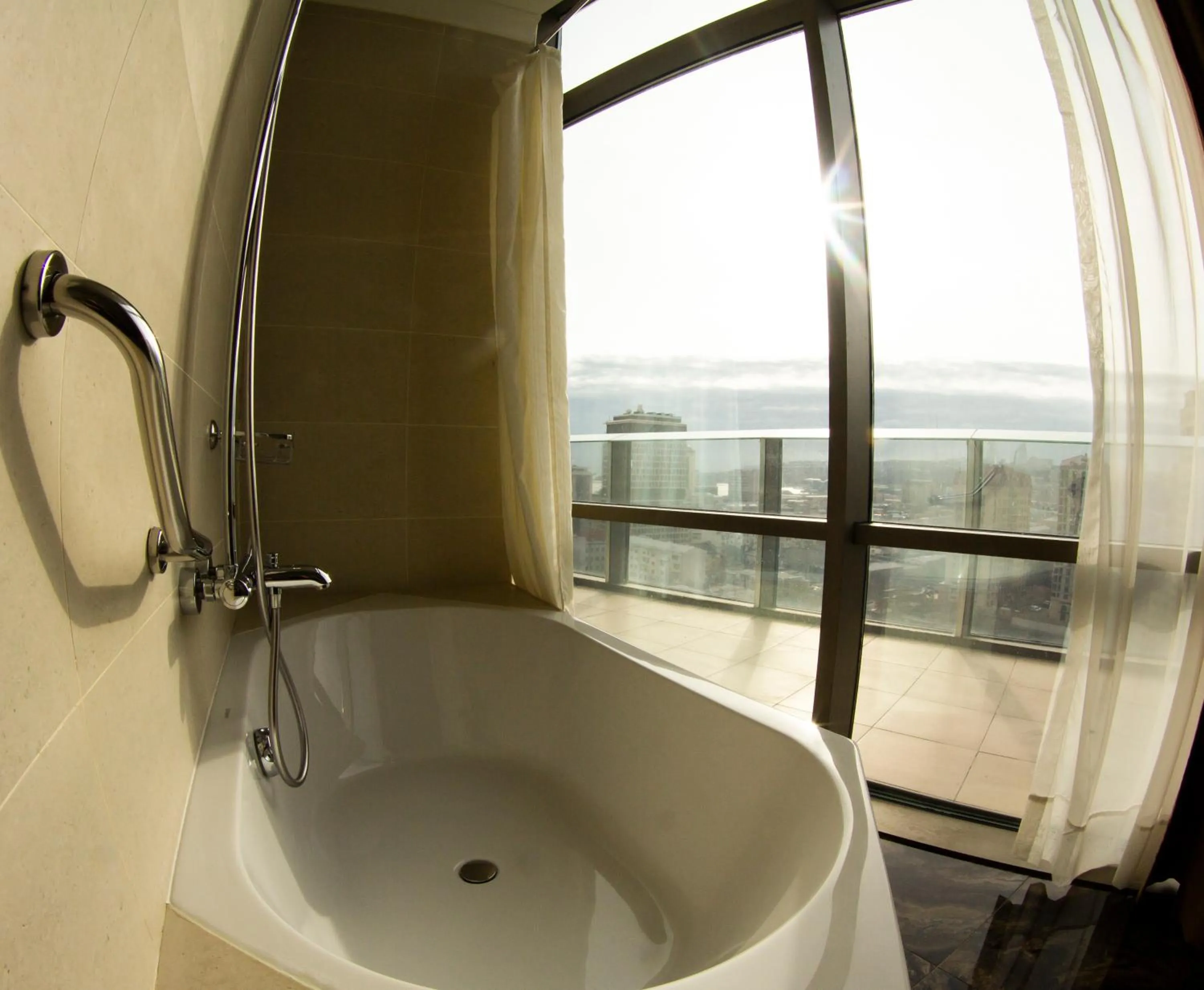 Bathroom in Parkside Hotel & Apartments