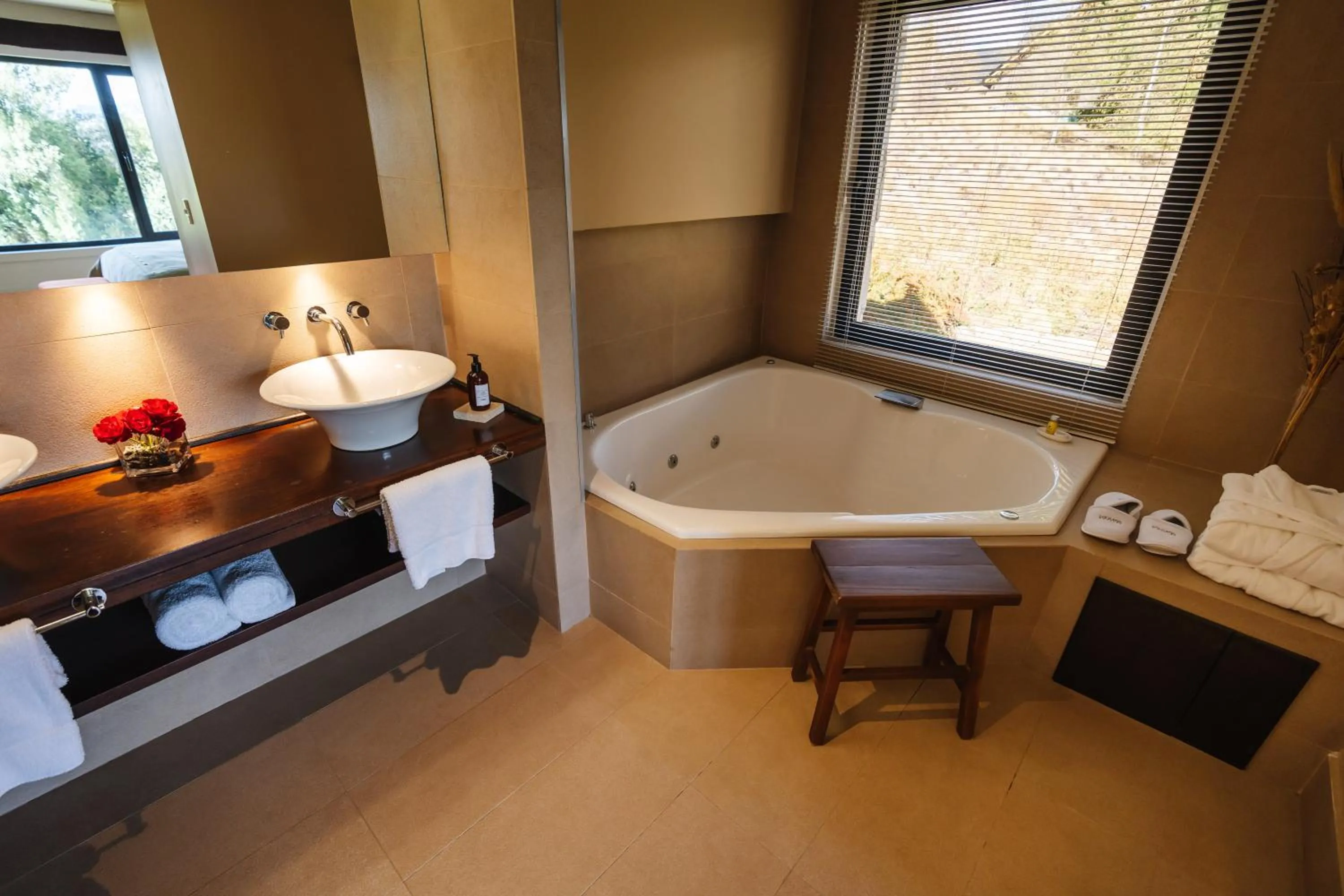 Toilet in Loi Suites Chapelco Hotel