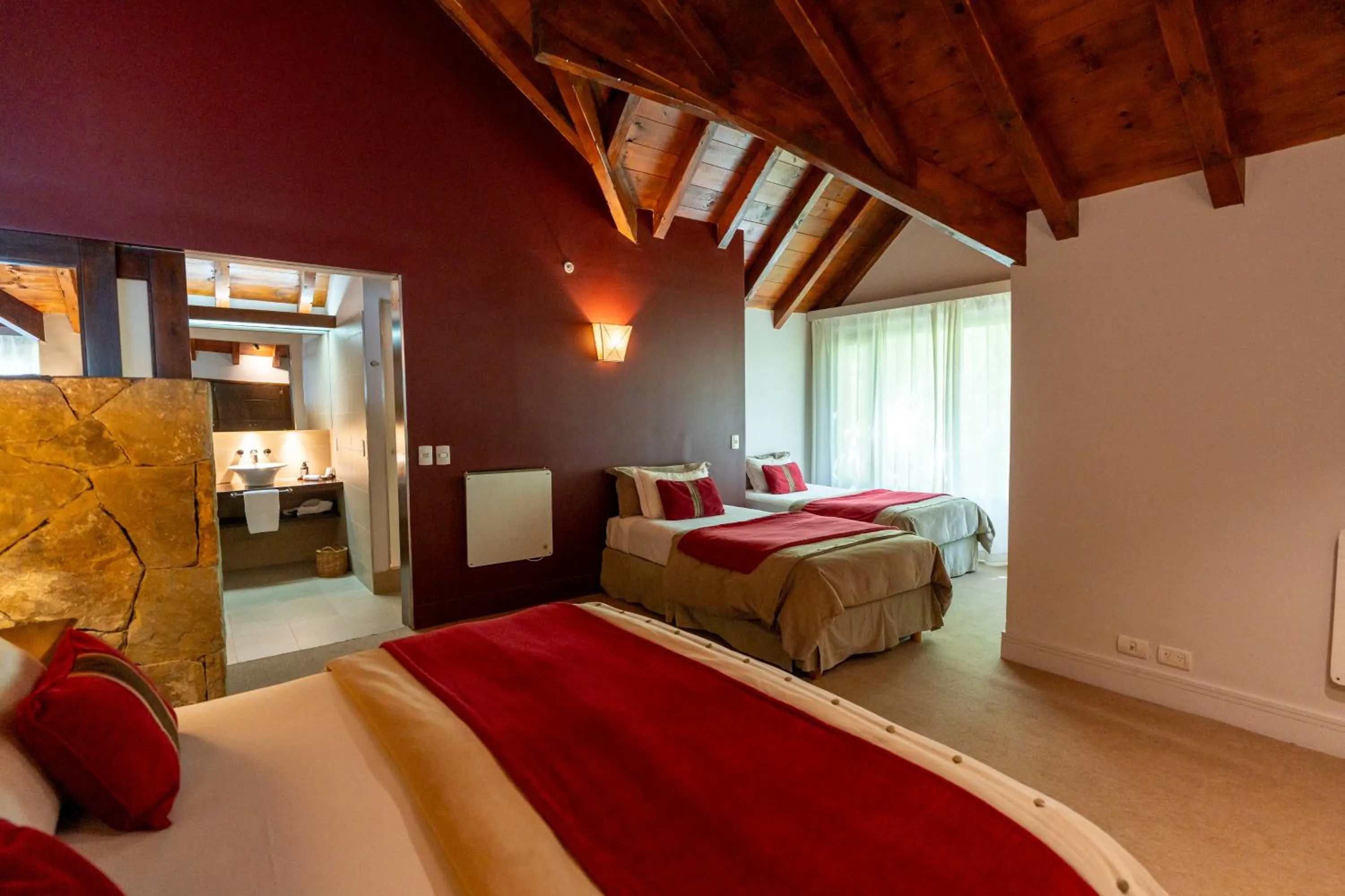 Bed in Loi Suites Chapelco Hotel