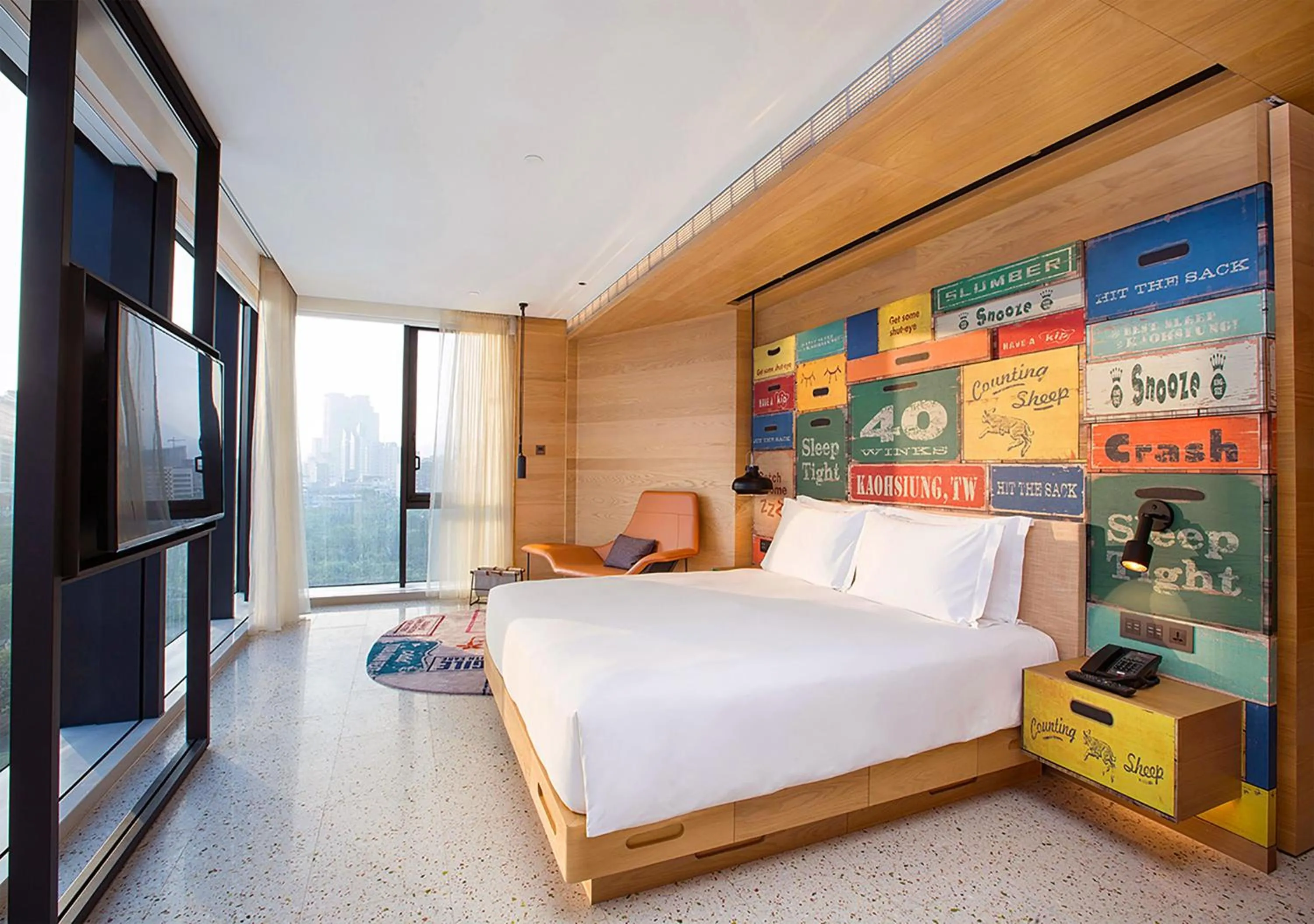 Photo of the whole room, Bed in Hotel Indigo Kaohsiung Central Park by IHG