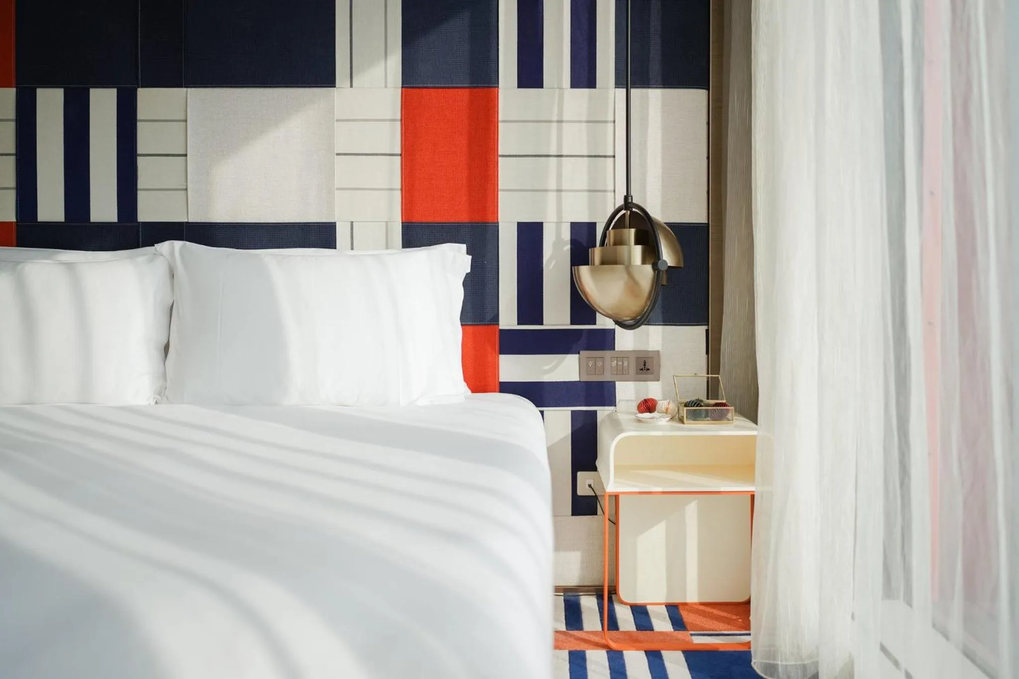 Photo of the whole room, Bed in Hotel Indigo Kaohsiung Central Park by IHG