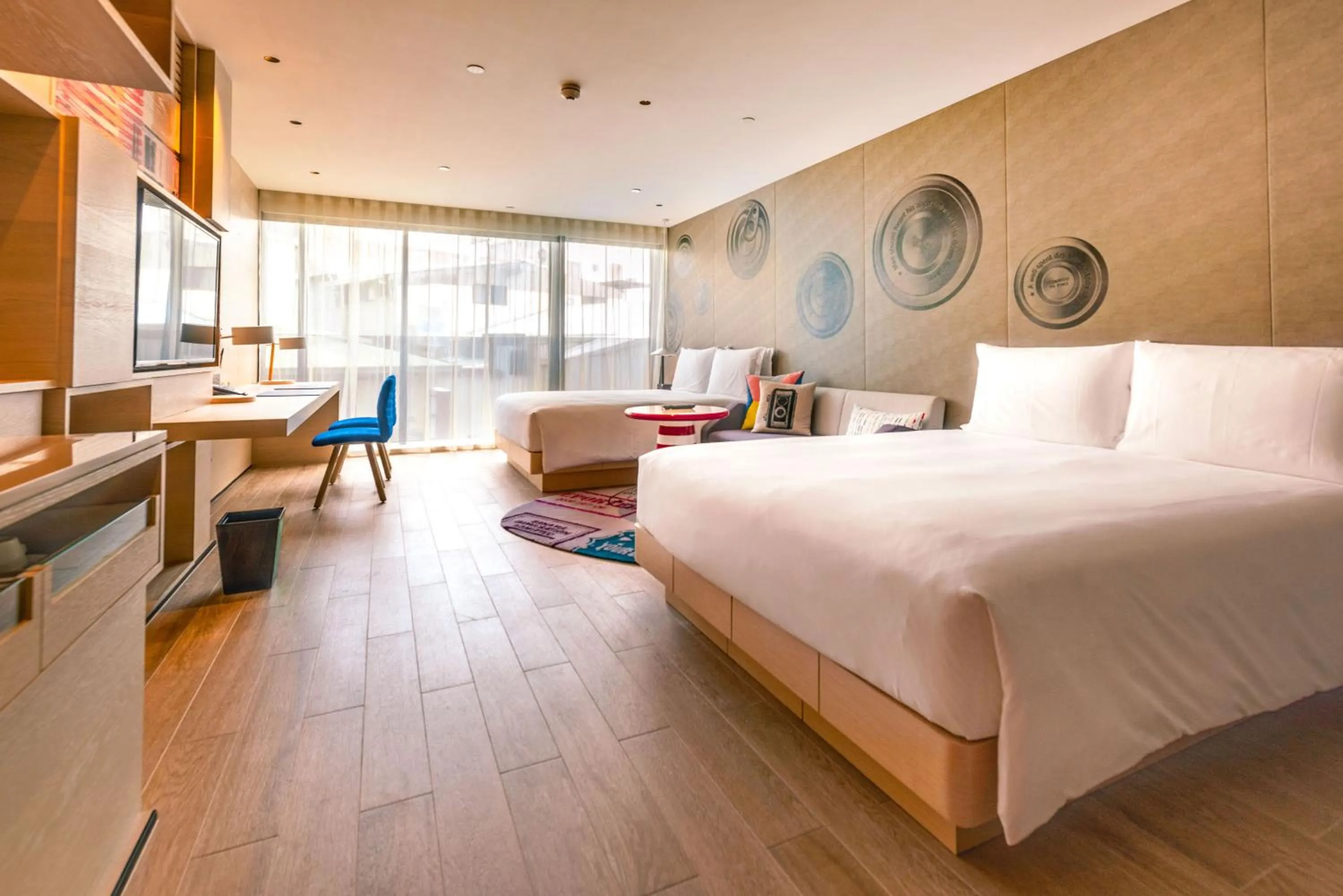 Photo of the whole room, Bed in Hotel Indigo Kaohsiung Central Park by IHG