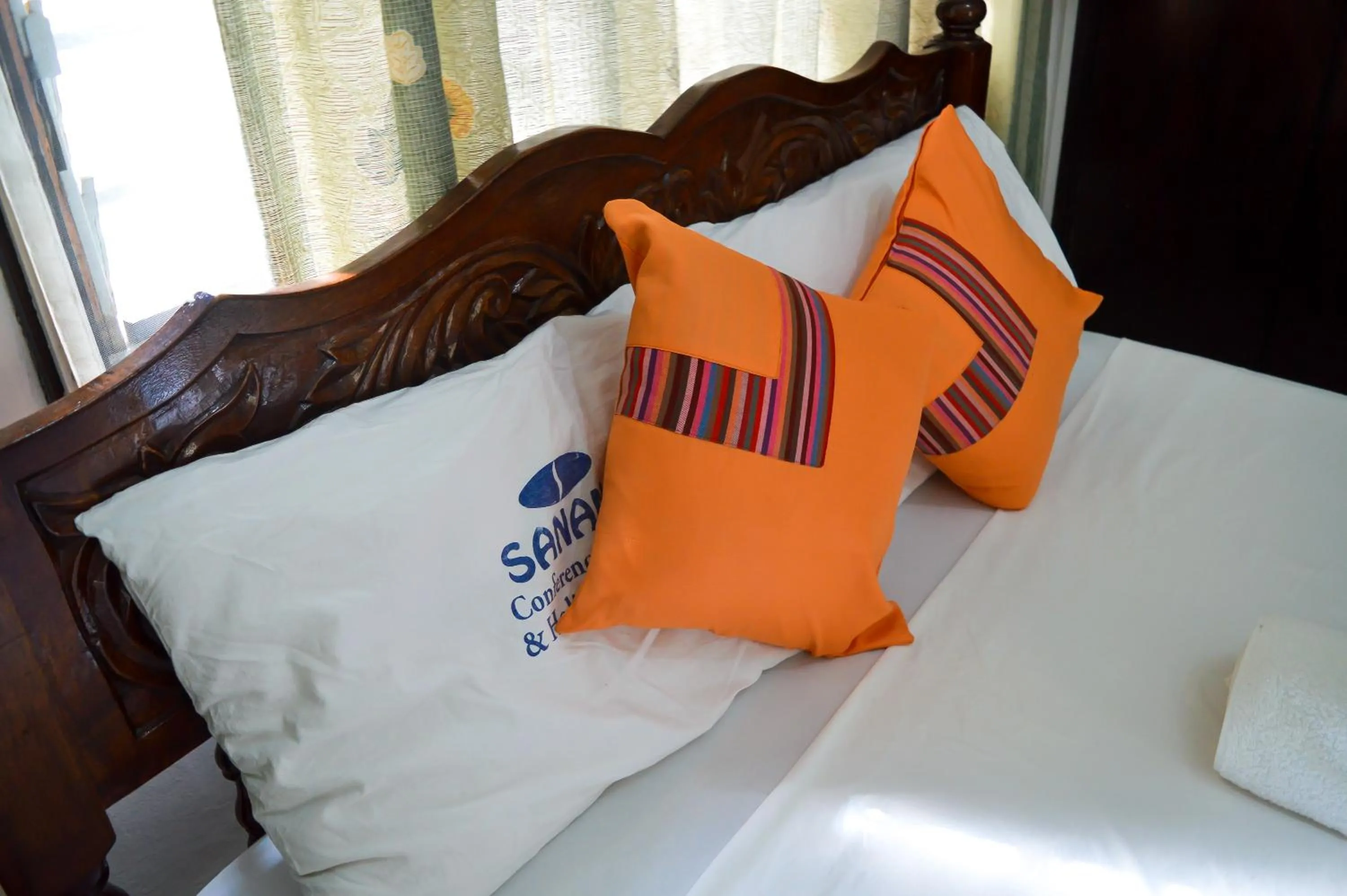 Bed in Sanana Conference Center and Holiday Resort