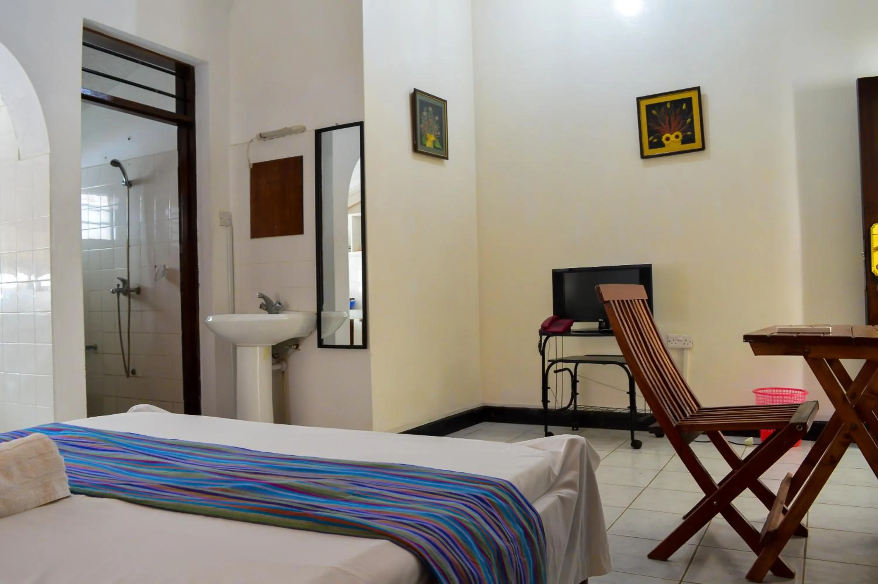 Bed in Sanana Conference Center and Holiday Resort