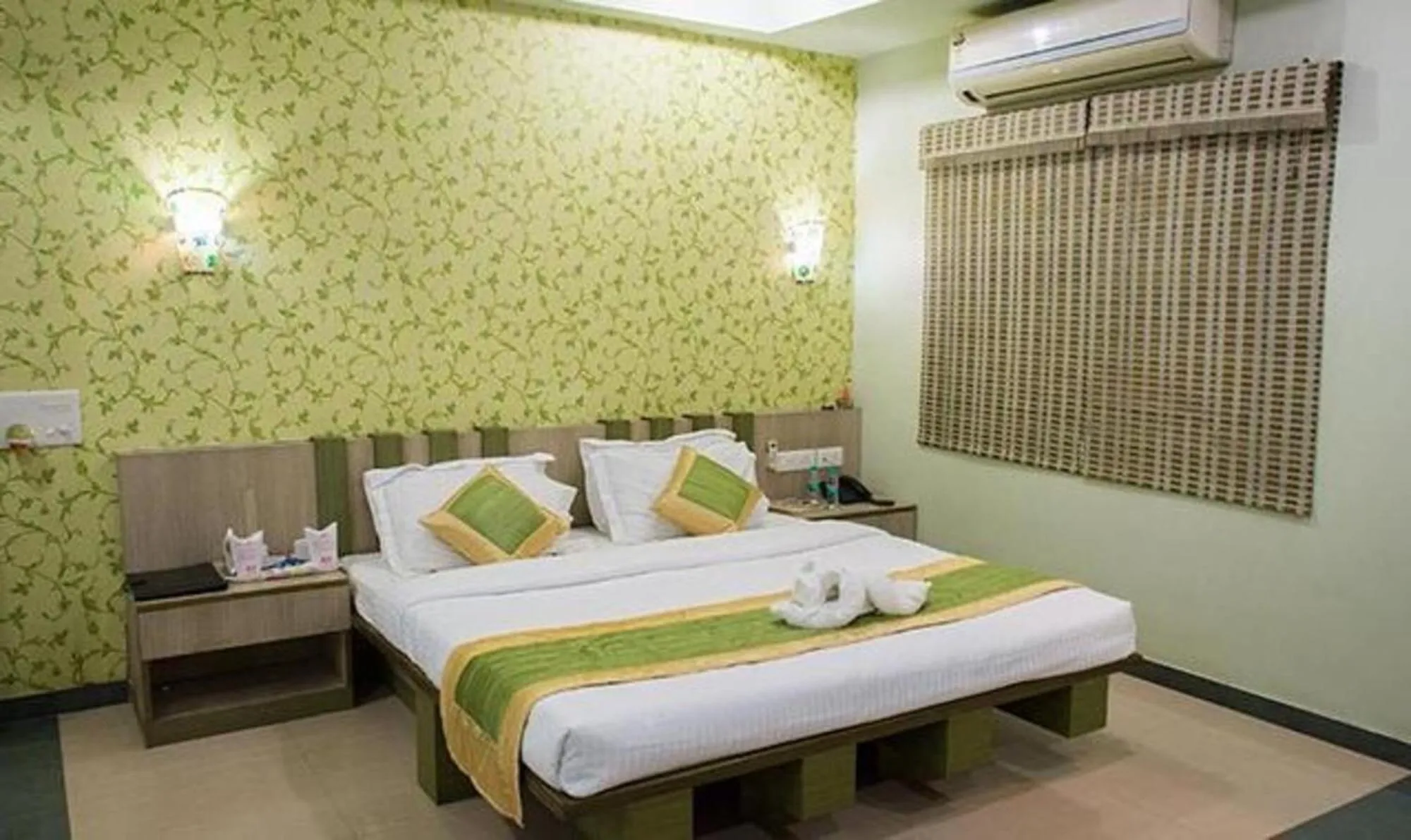 Bed in Vora Corporate Inn
