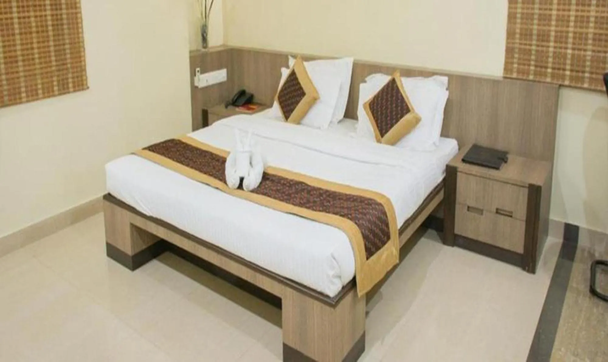 Bed in Vora Corporate Inn