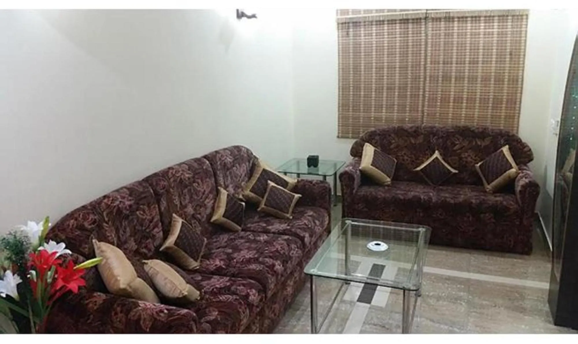 Seating area in Vora Corporate Inn